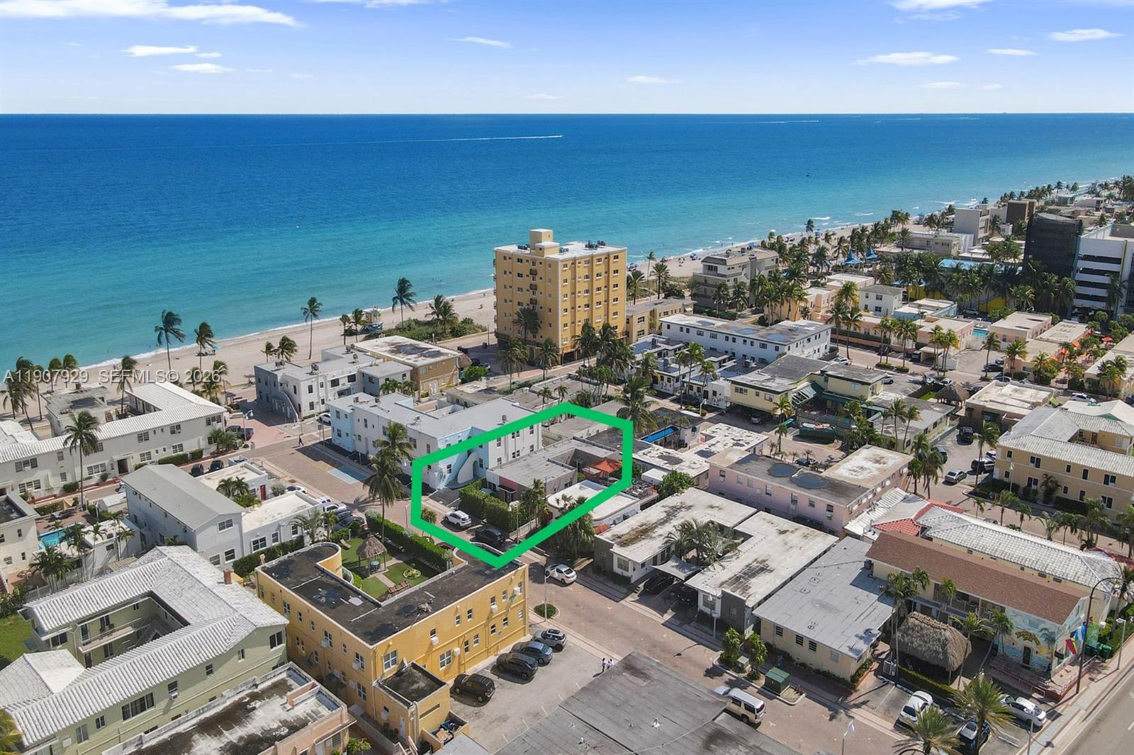JUST REDUCED $800,000!  Currently 6-8% CAP RATE. Are you a developer? Check the zoning which allows you to build a 5-story 18 room hotel which is the absolute best use of this opportunity by combining the adjacent lot at 326 Oklahoma, also for sale. We have an architect already approved to help you! While you wait for that, discover a rare opportunity to own a luxury, fully renovated LEGAL triplex (4 BR / 4 Bath) located in the exclusive Resort Zone of Hollywood Beach, just steps from the ocean & world-famous Boardwalk. Completely remodeled in 2016, this turnkey property features three beautifully furnished units, each with private entrances, modern interiors, stainless steel appliances, & independent A/C, water, & electric meters. Currently operating as high-performing Airbnb vacation rentals, the property enjoys exceptional occupancy rates, making it ideal for investors seeking strong cash flow. Additional highlights include impact windows, a shared laundry facility, access to biking, kayaking, paddleboarding, boating. All furniture incl. Property is a fully operational STR for over 5 years. You're not just buying real estate, you're buying a business with an established repeat revenue stream that comes directly to you. Which means you don't need to pay fees to airbnb or other platforms. List of repeat tenants included in the price. Seller financing available, at least 30% down, 6% interest, 3-5 yr balloon, and seller in 1st position ONLY!