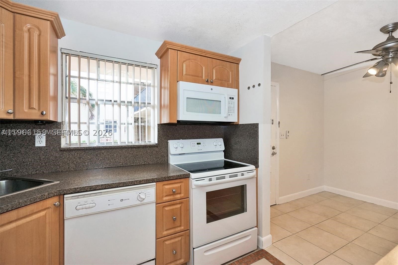 Well-maintained 2-bedroom, 2-bath first-floor condo in a quiet, centrally located Kendall community. This unit features tiled floors throughout, a fenced-in patio perfect for relaxing, and an exterior laundry room conveniently located just steps from the unit. Located in a gated community offering a pool, clubhouse, and children’s playground. Excellent location close to 826 Expressway, Kendall Drive, Dadeland Mall, and Baptist Hospital, with A-rated schools nearby. A great opportunity for homeowners or investors alike.