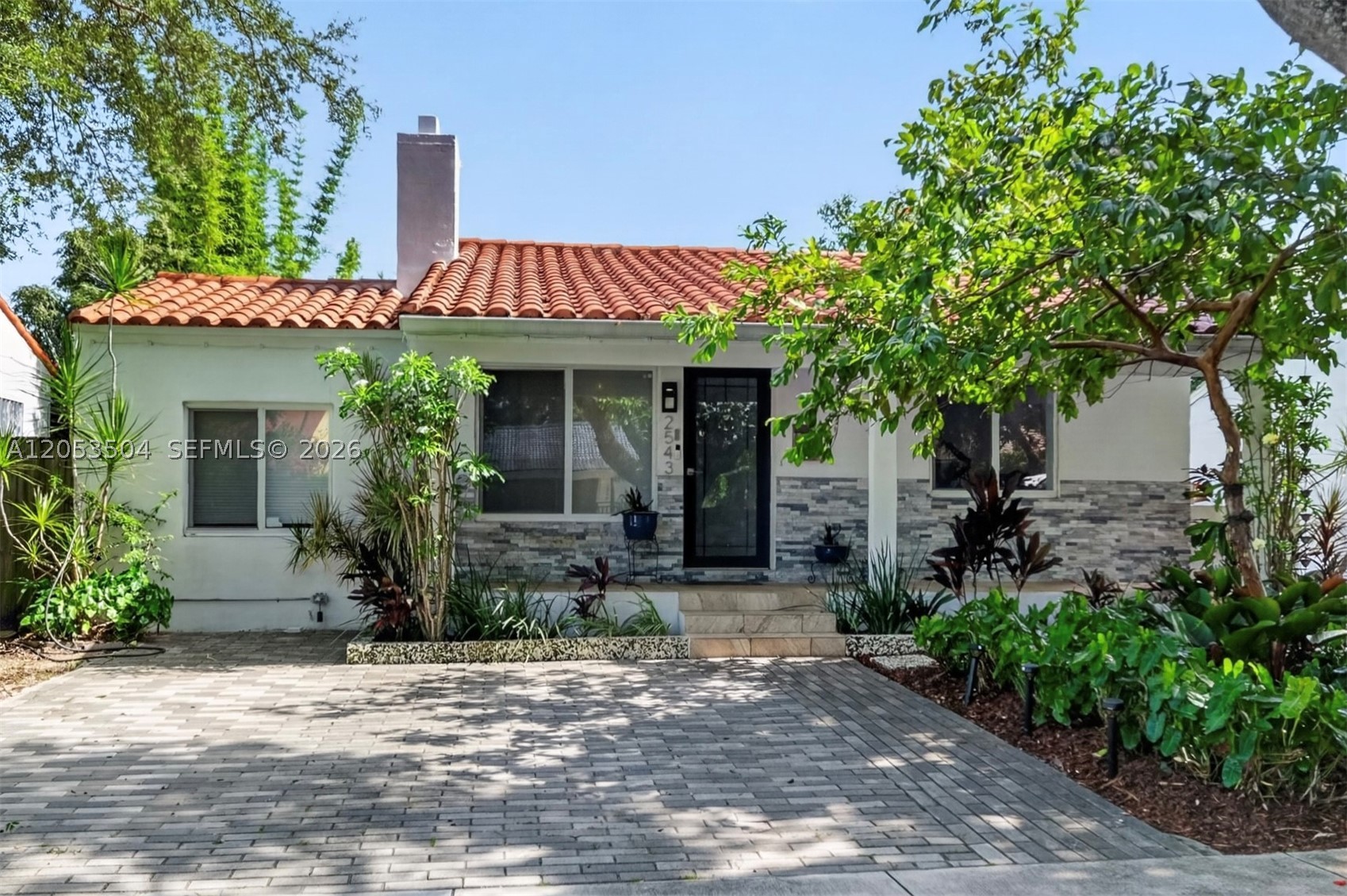 Welcome to Shenandoah, one of Miami's most established neighborhoods, where you can live among comfortable tree-lined streets just minutes from the heart of the city, parks, world class shopping and dining along Coral Way.  This fully renovated home features a total of 5 bedrooms and 3 bathrooms with over 2200 sq ft of living space.  The floor plan is ideal offering plenty of space between bedrooms or the ability to accommodate up to 2 home office configurations.  In addition to the office space and bedrooms, this home is large enough to accommodate 2 dining rooms, plus family and living rooms.  Outside you’ll find a fully fenced yard, lush tropical landscaping, expanded patio for comfortable outdoor living, 2 car driveway parking with EV Charger, and a classic Miami facade with open porch and charming curb appeal.  Additionally, the grounds include mature fruit-bearing lychee and guava trees - a true South Florida touch that offers shade, privacy, and seasonal harvests right at home. This is the one that checks all the boxes! Welcome home.