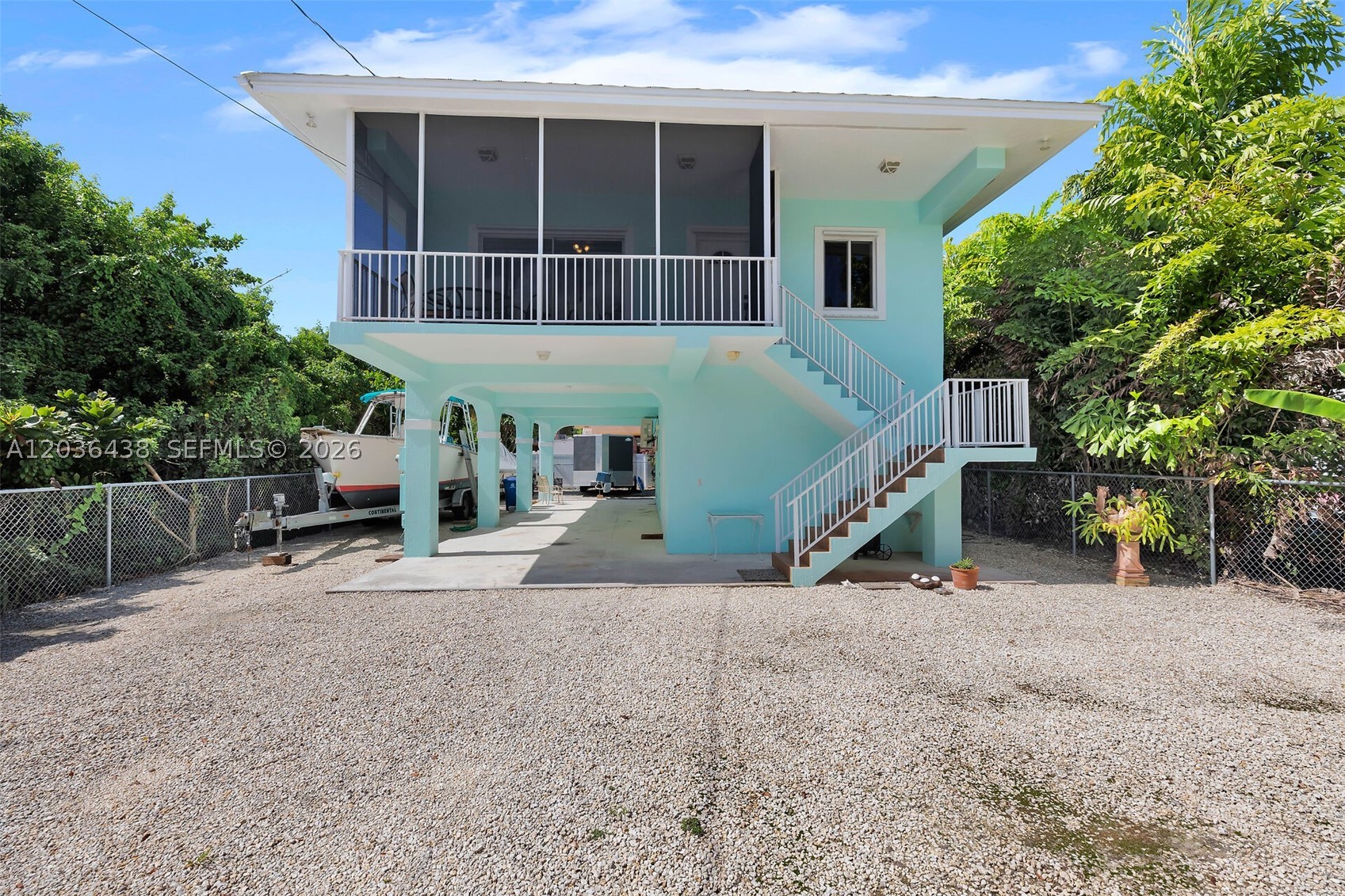 Enjoy the Florida Keys lifestyle in this elevated CBS home located in Riviera Village community of Key Largo. Featuring a new roof, and an oversized downstairs storage area, this property offers plenty of room for all your boating and recreational gear. Ample parking accommodates boats, trailers, RVs, and other toys with ease. This well-maintained home offers 3 bedrooms and 2 bathrooms and is ideally situated just three lots from the homeowners park. Residents enjoy access to a new constructed private boat ramp and protected basin, allowing boat owners to keep their boats in the water for up to 72 hours. Spend your evenings strolling to the park to take in spectacular sunsets over Blackwater Sound, relax on the bayfront beach, enjoy a swim, a sunset or launch your boat for a day on the water. This is Keys living at its finest, with boating, fishing, and waterfront recreation right at your doorstep. 45 minutes from Miami and you are in paradise.