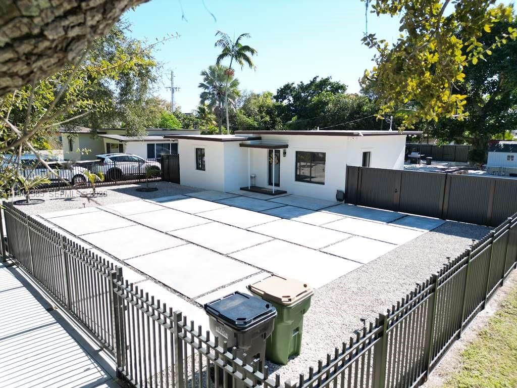Beautifully renovated 2-bedroom, 1-full bath residence in Miami, featuring new central A/C (2023
), hurricane impact windows and doors, and a new kitchen and new stainless-steel appliances. interiors include porcelain flooring throughout. Bathroom is finished floor-to-ceiling, modern vanity, and mirror. Additional upgrades include a tankless water heater, freshly painted interior/exterior, Fence with gated entry, and new professional landscaping. with endless potential for outdoor living and entertaining. Enjoy privacy with a fully fenced yard and plenty of room for parking. NO HOA. Excellent opportunity for homeowners or investors seeking a property in a high-demand rental area. Conveniently located near major highways, shopping centers, schools, and public transportation. MOVE-IN READY.