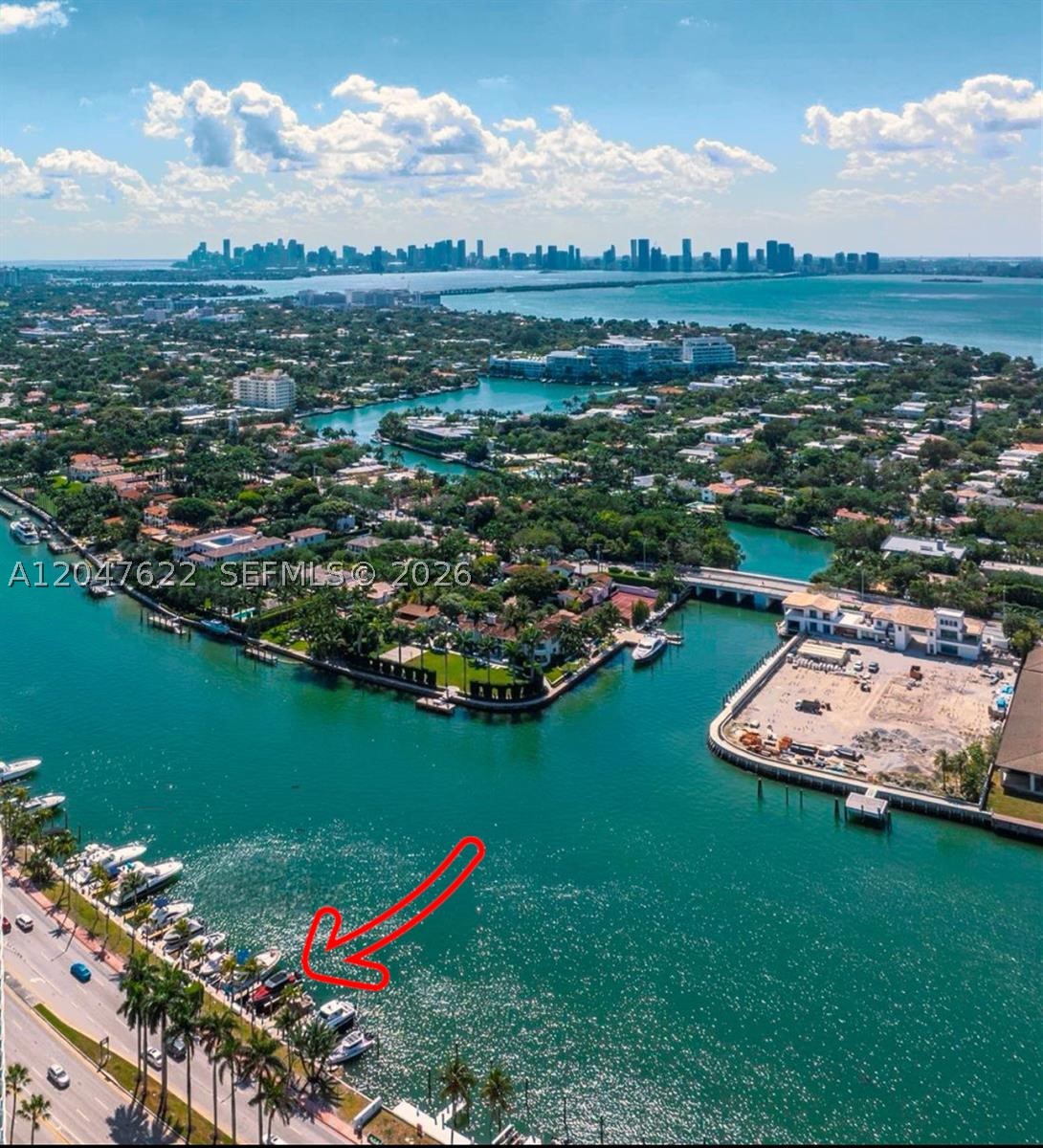 This 36ft boat slip has it all: location on iconic Millionaire's Row of A1A/Collins Ave, water & electric included, and a $50K boat lift for safe storage & lower maintenance.
Dock on the Intracoastal is protected from storms but offers easy in with your choice of valet parking and a public parking lot just down the sidewalk, and easy navigation out to the beach and ocean with no fixed bridges.
Make friends on both sides of the intracoastal: short walk from Seacoast 5151 & Suites, Crystal House, Capobella, Carriage Club, Executive Condo, Grand Beach Hotel, Miami Beach Resort & Spa -- and CEO Bill Dean's $53M party mansion is directly across the Intracoastal.