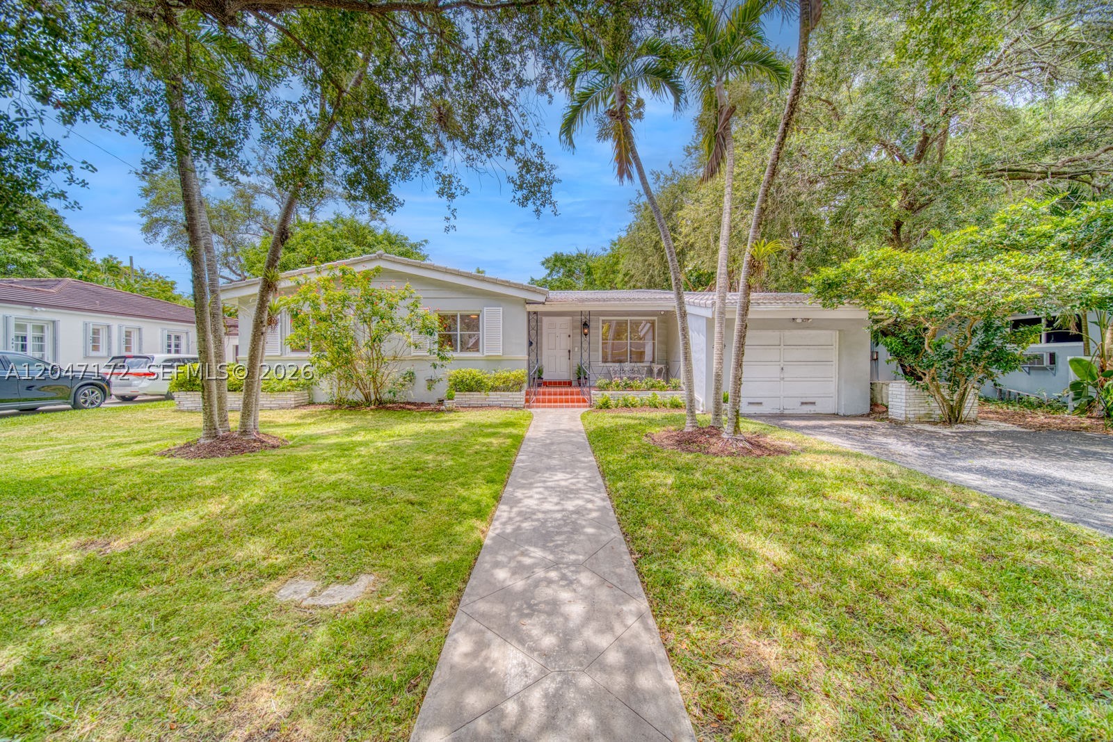 Charming 3-bedroom, 2-bathroom home in the heart of Coral Gables. Perfectly situated on a beautiful, quiet, tree-lined street, this property offers an exceptional opportunity to move right in, renovate to your taste, or reimagine it on its generous lot with endless possibilities. Inside, you'll find a bright open concept living area designed for comfortable everyday living and entertaining. The home also features impact windows, a one car garage, and a spacious backyard with plenty of room to create your dream outdoor oasis. The unbeatable location is just steps from the iconic Venetian Pool, the historic Biltmore Hotel, Salvador Park, and some of Coral Gables' top-rated schools. Whether you're looking for a forever family home or an incredible investment opportunity, this property combines timeless charm with one of the city's most desirable addresses. Location, location, location—don't miss your chance to make this special Coral Gables home your own.