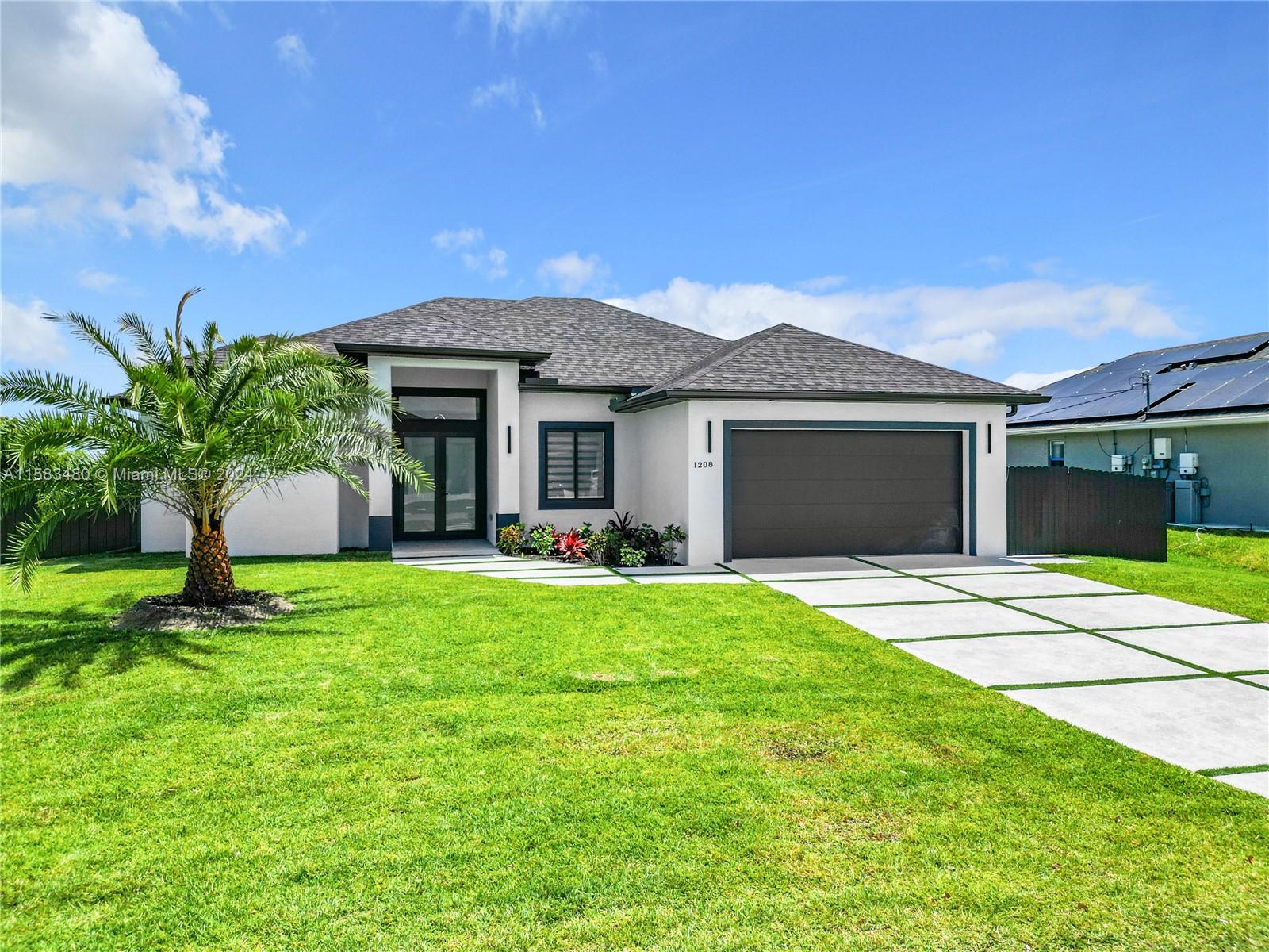 $10,000.00 contribution for closing. Beautiful NEW CONSTRUCTION ready for you! Property features 4 Bedrooms, 3 Full Bathrooms, a 2 Car-Garage, and pool. Lots of natural light throughout the home, elegant porcelain tile flooring spread across all rooms and delightful light fixtures to boost. The kitchen features quartz countertops, stainless steel appliances, and modern kitchen cabinetry with plenty of storage space. Hurricane impact windows and doors. The pool oasis with built in BBQ perfect for entertaining. Enjoy living in Cape Coral where fishing, boating, kayaking, and relaxing are all excellent ways to spend the day.  You're just a quick commute away from beaches, restaurants, shops and more.