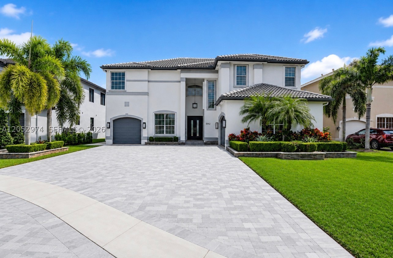Luxury, Bright Turn Key Home! Featuring 5 Bed, 3.5 Bath, 3 Car Garage Home in the Highly Desirable Sunset Lakes Community in Miramar. This 3,900 SqFt home Features Porcelain tile throughout, Modern Lighting, a Newer A/C, and a Split Floor Plan with 1 Bed and 1 Full Bath on the First Floor, Ideal for Guests or a Private In-Law Suite. This Fully Remodeled Home Features a State of the Art Kitchen  Equipped with Quartz Countertops, a Large Center Island, Double Ovens, and Bosch Stainless Steel Appliances. The Oversized Primary Bedroom offers Dual Vanities, a Freestanding soaking Tub, and a separate Walk-in Shower. Enjoy Outdoor Living with Two Pergolas, a Saltwater Pool and Spa with a New Diamond Brite finish, Outdoor Charcoal Grill, Mini Fridge, and a Marble Driveway. Residents enjoy Resort-Style Amenities including 24-hour Gated Security, a Clubhouse, Fitness Center, Pool, Tennis and Basketball Courts, Playgrounds, Walking Trails, and Scenic Lakes. Residents also Enjoy Access to Top-Rated A-Plus Schools, Upscale Shopping and Dining, and Convenient Access to I-75 and the Florida Turnpike—Offering the Perfect Blend of Luxury, Lifestyle, and Connectivity!