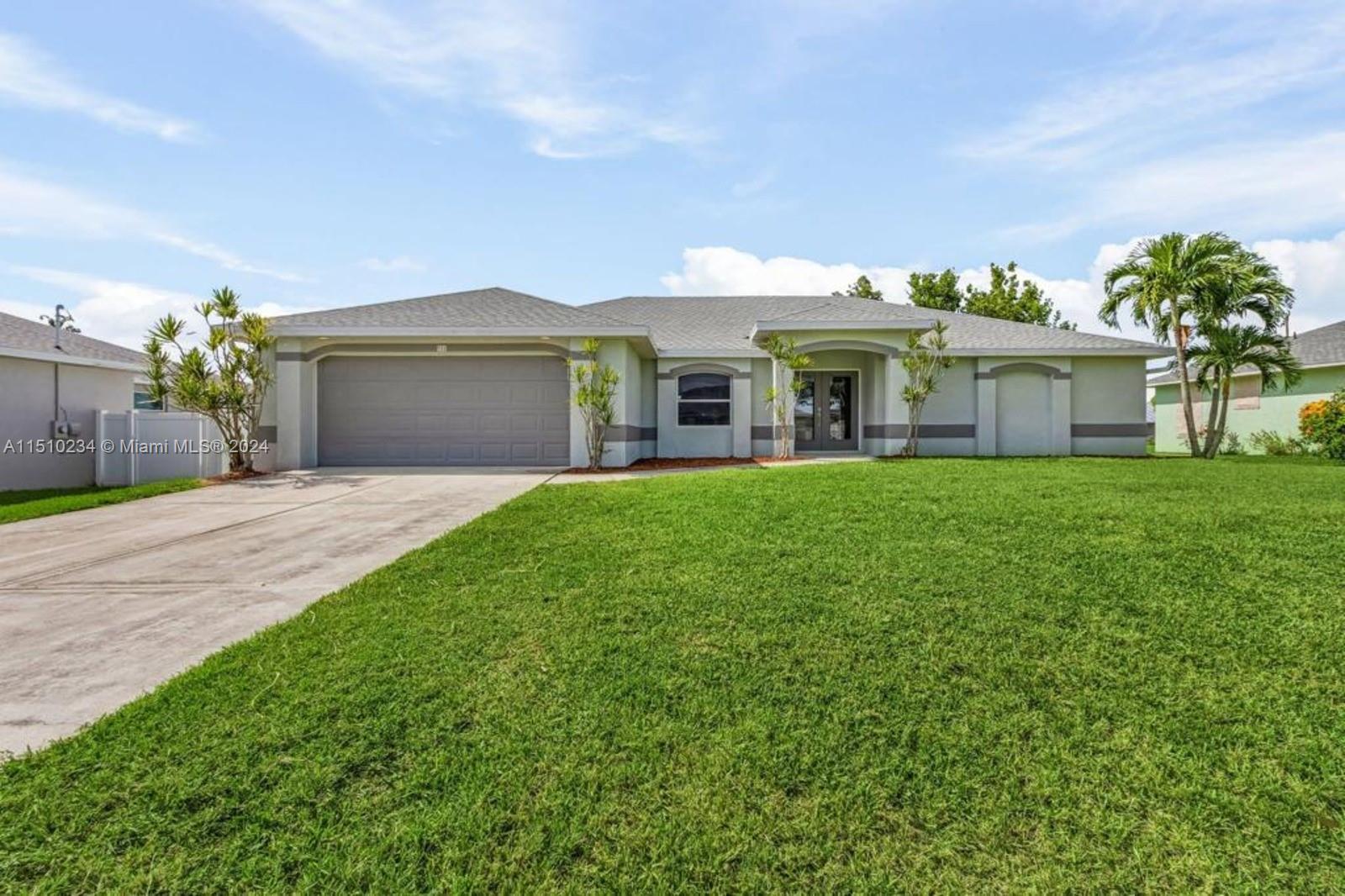 Welcome to your gateway to elegance in Southwest Florida. This remodeled pool home isn't just a residence; it's a lifestyle transformation. The open layout leads from a state-of-the-art kitchen with stainless-steel appliances and quartz countertops to a lanai enclosing a serene pool with brand new pool cage. The new roof assures comfort for years. Three bedrooms and a den, including a master suite with a walk-in closet, and a versatile den cater to every need. An extra room is perfect for a home office or bedroom. Two-car garage combines functionality with style. Located in Cape Coral with top-tier schools, dining, and shopping are moments away. Ideal for a growing family or an Airbnb investment. The motivated seller welcomes all offers. Claim this exquisite home as your own.