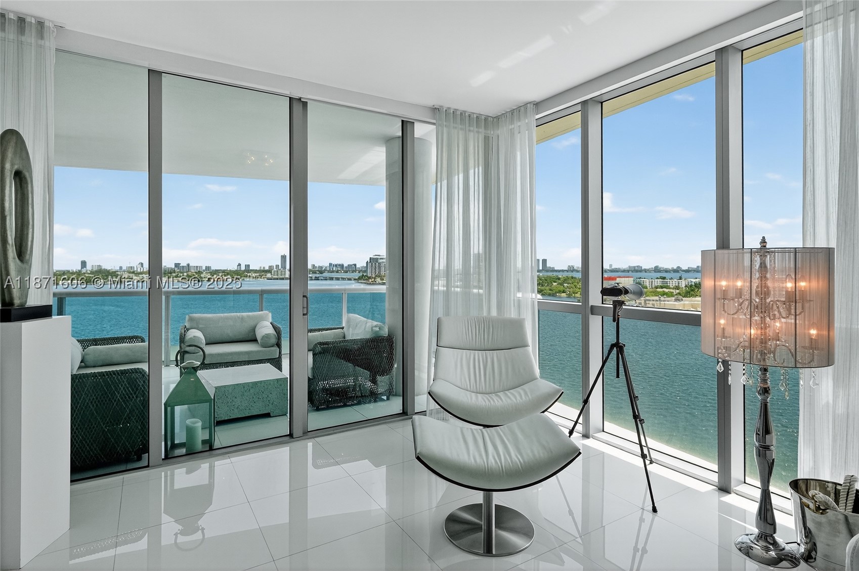 Luxury Waterfront Corner Condo in Cielo on the Bay, North Bay Village. Enjoy breathtaking sunrise and sunset views from this corner unit with floor-to-ceiling windows, automated blinds, and two spacious terraces. Private elevator opens directly into a beautifully furnished home, perfect for relaxing or entertaining. Includes 2 parking spaces and a storage unit. Amenities feature a rooftop pool, concierge, fitness center, and yacht/kayak dock with ocean access. Located minutes from beaches, dining, and airports in a recently upgraded building with only 32 residences, was upgraded in 2023 with a new lobby, roof, and dock.