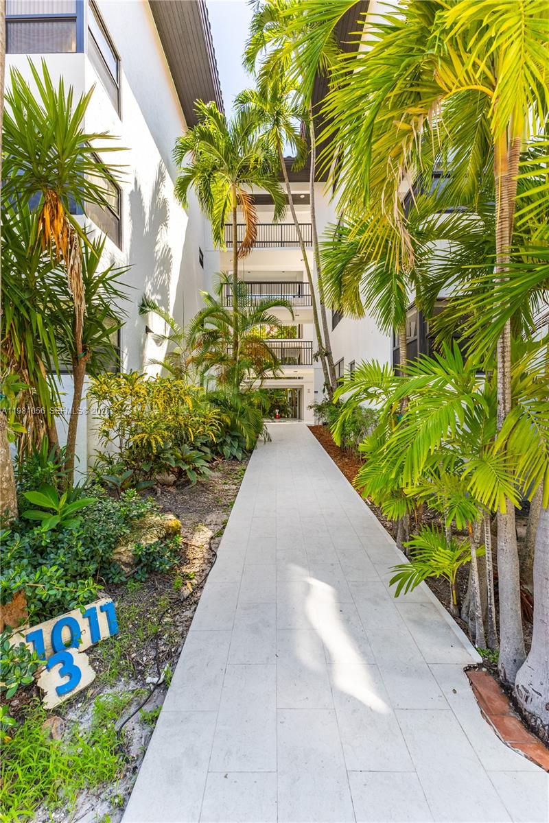 RARE ON THE MARKET!! Discover this spacious and bright 2/2 one-of-a-kind lanai at Ocean Village, Key Biscayne. This unit features a screened and covered private terrace with beautiful pool views, surrounded by lush greenery. The property in perfect condition offers a seamless connection between indoor and outdoor living. The kitchen is completely new, all windows throughout the unit are impact. The building has been fully remodeled, and all assessments are paid. Ideally located within walking distance to the beach, shops, and restaurants, this condo truly feels like home.