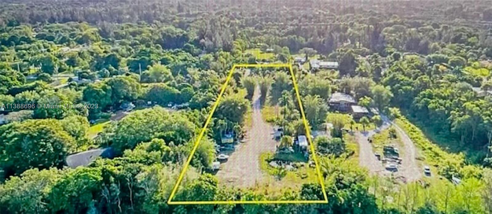 BEAUTIFUL 2.5 ACRE PARCEL IN THE HEART OF SOUTHWEST RANCHES. ZONED A-1 WITH MANY DIFFERENT TYPES OF BUSINESS USES. THERE IS A SEPTIC TANK, 2 WELLS, 1 FOR MOBILE HOME W/WATER & ELECT, AND 1 FOR IRRIGATION. INCLUDES FULLY OPERATED PUMP FOR TRAILER, 2ND STAND BY OR IRRIGATION. ELECT THROUGHOUT THE WHOLE PROP., PAVED AREA COVERED FOR WORK SPACE & PARKING, SEC. CAMERAS THROUGHOUT THE PARCEL. ELEVATED BERMS AROUND FOR ADDED PRIVACY & IN THE BACK W/A 10Ft Wx15 Ft D POND FOR WATER RETENTION.*Developers, general/nursing contractors,nurseries & gardening,equestrian farms owners.* Lush acres of land ready to build your dream home. Plumbing & electricity in place w/a nice mobile home.