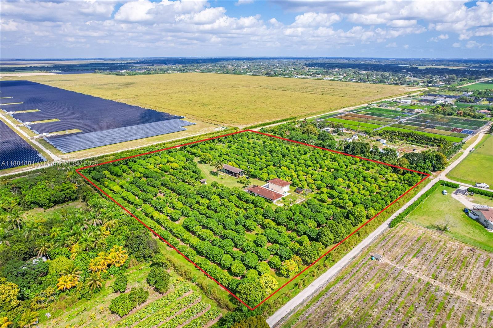 REDLAND 10 AC (GROSS) LYCHEE GROVE FEATURING A 3/2 COUNTRY FARMHOUSE W/ GARDEN, FEATURES INCLUDE: DETACHED DBL DECKER WAREHOUSE W/ APARTMENT & OFFICE, POLE BARN W/ A/C OFFICE & SECURITY CAMERAS ON PRIVATE NETWORK. SITUATED ON A RURAL ROAD, THIS ONE-OF-A-KIND PROPERTY IS CLEAN W/ ASSORTED LYCHEE GROVE (+/- 500) & ZONED IRRIGATION. THE HOME IS A SPLIT PLAN W/ AN AMAZING CHEFS KITCHEN W/ COMMERCIAL GRADE GAS STOVE W/ DBL OVENS. THE MAIN SUITE HAS A PRIVATE LANAI W/ JACUZZI. ADJACENT TO THE HOME IS A DET. 2 STORY GARAGE/WAREHOUSE W/ HURRICANE PROOF TANDEM 13X10 DOORS WITH 2 BATHS 1 IS DOWNSTAIRS FOR STAFF, UPSTAIRS IS A 1/1 APARTMENT W/ KITCHEN. THE POLE BARN HAS AN A/C OFFICE & SECURITY CAMERAS, FULL POWER AND FERTILIZING STATION W/ COMPRESSED AIR. RV HOOK UP AVAILABLE. ENLARGE PHOTOS