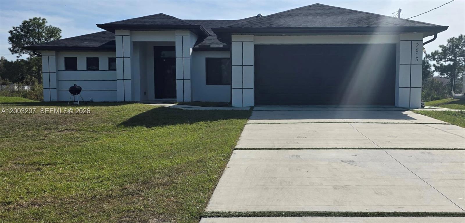 INVESTORS ONLY home in Lehigh Acres! (TENANTS IN PLACE)This stunning single-family home boasts 3 bedrooms + a Den, 2 bath and a 2-car garage, providing ample space for you and your family to live comfortably. As you step inside, you'll be greeted by a spacious den, perfect for those who work from home or use for an extra bedroom. The kitchen is a chef's delight, featuring granite counters, stainless steel appliances, and modern fixtures. The tile flooring throughout the home adds a touch of elegance, while the coffered ceilings and impact doors and windows provide both style and security. The large primary suite is a true retreat, with 2 closets for all your storage needs and an ensuite bath with dual vanities and a large walk-in shower. Step outside to the extended lanai, where you can enjoy the Florida sunshine and entertain guests in style. One of the standout features of this home is the large laundry room, complete with cabinets and plenty of storage space. Say goodbye to cluttered laundry rooms and hello to organization and efficiency. The modern white gourmet kitchen is a showstopper, with sleek cabinetry, a spacious island, and top-of-the-line appliances. Whether you're cooking for a crowd or just whipping up a quick meal for yourself, this kitchen has everything you need to make mealtime a breeze. This home is perfect for those who appreciate quality craftsmanship and modern design. From the moment you walk through the door, you'll be impressed by the attention to detail and the high-end finishes throughout. The open floor plan is perfect for entertaining, with plenty of space for guests to mingle and relax. The neutral color palette and clean lines create a sense of calm and tranquility, making this home the perfect oasis from the hustle and bustle of everyday life. Don't miss your chance to own this beautiful home in Lehigh Acres. With its prime location, luxurious amenities, and modern design, this home is sure to impress even the most discerning buyer. Seller will contribute up to $5,000 for closing costs!