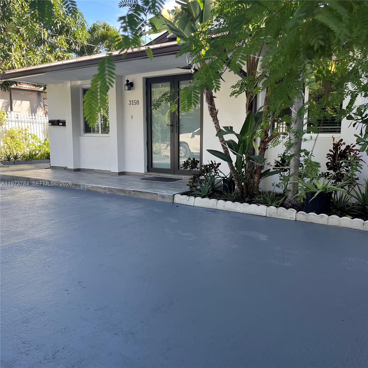 Front unit 3158. Charming 3/2 bath duplex, remodeled kitchen, metal roof, hurricane proof windows, tile throughout, washer and dryer. Ready to move in. Close to Coral Gables, school and highways. Background check, credit and proof of employment. Move in with two months, first month and security deposit.