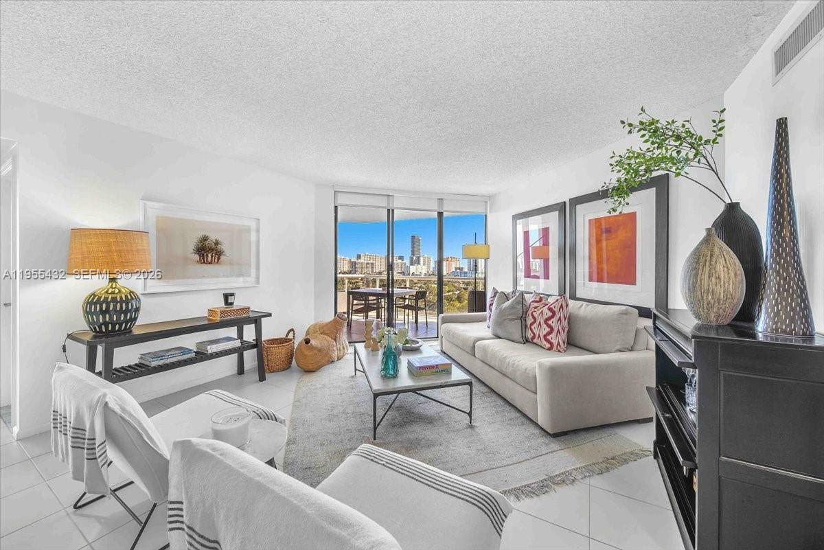 Experience the ultimate Aventura lifestyle in this light-filled, move-in ready 3BR/2BA condo. This furnished NE corner residence features floor-to-ceiling windows, wood flooring in bedrooms, upgraded kitchen/baths, new balcony tiles, newer appliances, and a reverse osmosis system. Includes 2 assigned covered parking spaces and a storage unit. Portsview @ The Waterways offers 24/7 security, 2 pools, jacuzzi, gym, tennis, library, and private Marina/Waterways access. Enjoy total buyer confidence with a completed Structural Milestone Inspection and transparent 2026 budget.