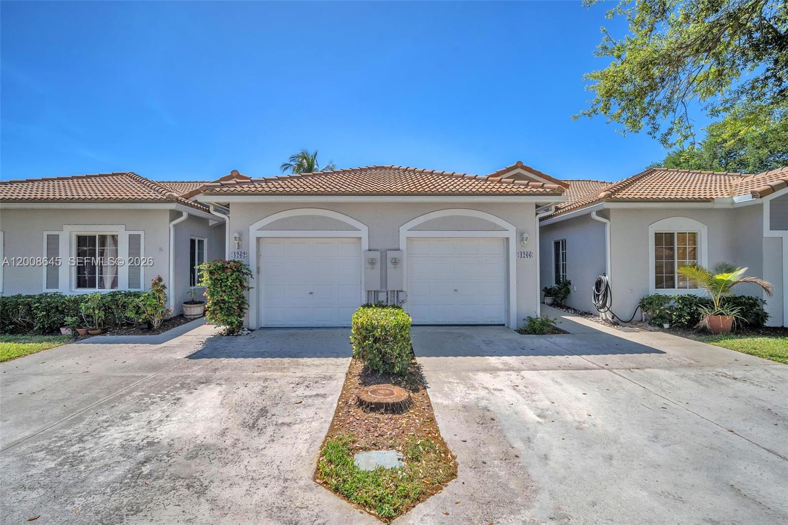 Best-Priced Villa in the Community! This beautifully maintained one-story villa with a private garage is tucked inside a gated, resort style community and is ready for its next owner. Step inside to a spacious, light-filled layout featuring ceramic tile throughout the main living areas, comfortable bedrooms, and a bright eat-in kitchen perfect for morning coffee. The primary suite offers a walk-in closet and private en-suite bath, while the screened patio invites you to unwind and enjoy Florida's year round sunshine. Major updates include a newer AC (less than 2 years old) for worry free living. The HOA covers it all  roof, insurance, cable/internet, landscaping, and access to incredible amenities including resort style pools, fitness center, clubhouse, tennis, pickleball, and more. FHA Approved and priced to move. This is the value you've been waiting for. Schedule your private showing today! Financial incentives with our preferred lender. Call for details.
