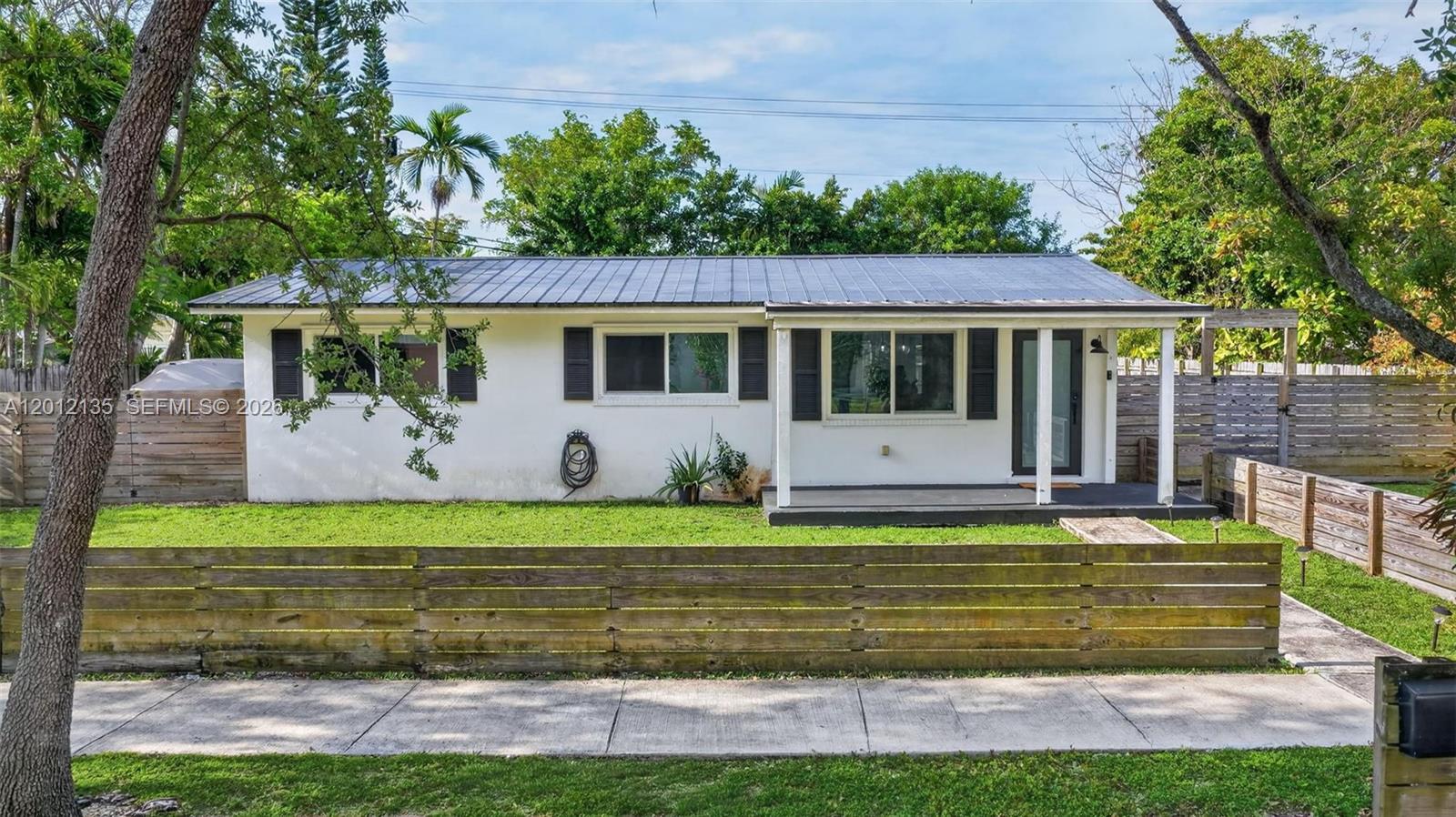 Charming farmhouse-style home in the heart of Cutler Bay! Beautifully remodeled 3-bedroom, 2-bath residence situated on a spacious 8,250 sq. ft. lot. Featuring a durable metal roof, modern upgrades, and plenty of room to park your boat or create the backyard oasis of your dreams with space for a pool. NO HOA!  Priced to sell and ready for its new owner. Contact listing agents today for a private tour!