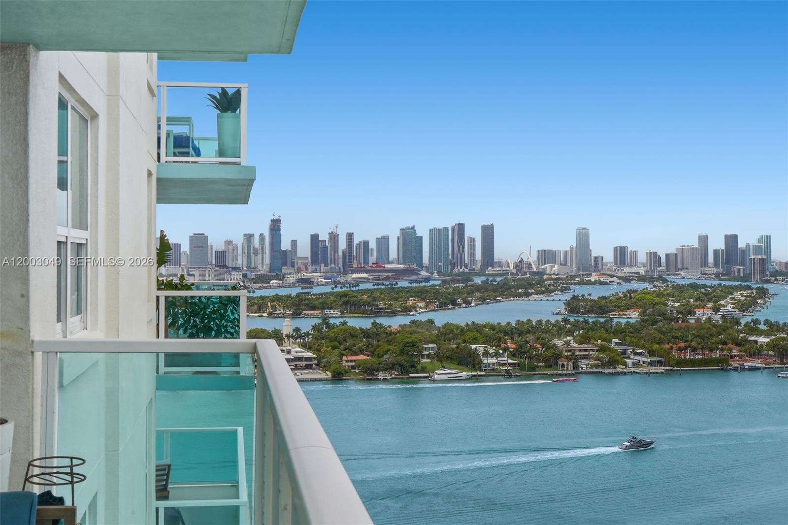 2-bedroom, 2-bath residence at The Floridian with wide open views of the ocean, Miami Beach, and skyline from every angle. This bright, spacious layout is filled with natural light and features a wraparound balcony, large living and dining areas, wood flooring in the bedrooms, stone tile in the main living spaces, in-unit washer/dryer, and ample closet space including a large walk-in closet in the primary suite. The kitchen offers granite countertops, stainless steel appliances, and generous storage. The Floridian is a full-service bayfront building with 2 pools, tennis, gym, spa, salon, market, valet, concierge, and 24-hour security. Prime West Avenue location across from Canopy Park and near South of Fifth, Lincoln Road, Whole Foods, and Miami Beach dining and shopping.