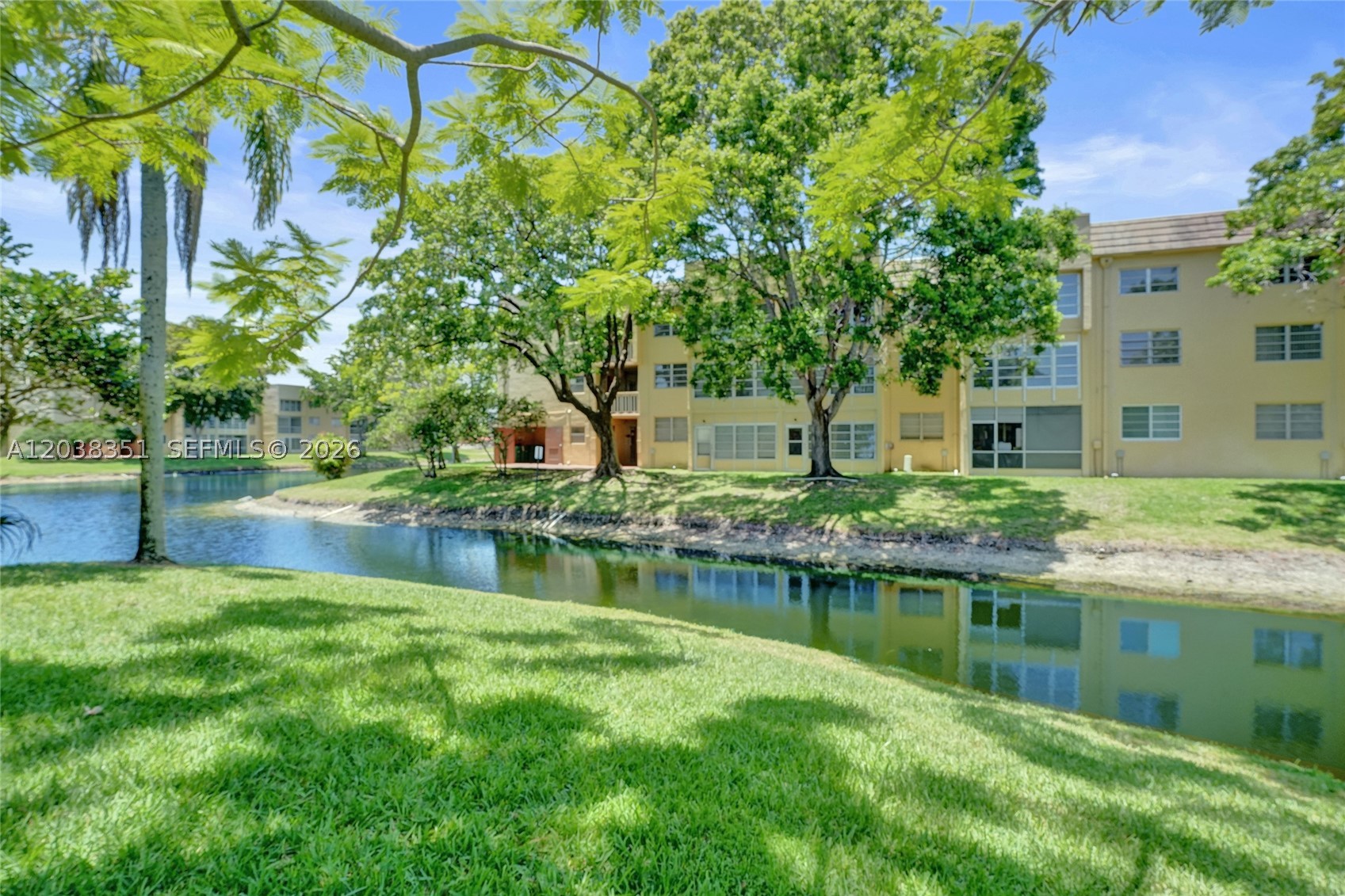 Welcome to your new home in the highly desirable Bermuda Club, a vibrant 55+ community in the heart of Tamarac. This charming 2-bedroom, 2-bath third-floor condo offers the perfect blend of privacy, featuring peaceful lake views that you can enjoy right from your living room. The unit is equipped with modern stainless steel appliances and includes the convenience of a dedicated parking space. Experience resort-style living, including four sparkling swimming pools, tennis courts, a clubhouse with a fitness center, and reliable transportation services. Centrally located for year-round living, you are just minutes away from major highways, shopping, and dining. Don’t miss out on this fantastic opportunity to live in a friendly, well-maintained community.