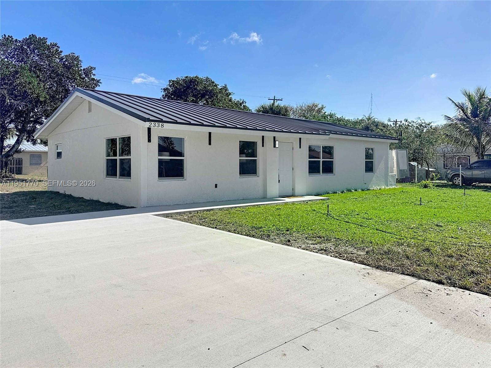 BRING ALL OFFERS.  MOTIVATED SELLER WILLING TO NEGOTIATE!
This isn't just a renovation; it’s a complete transformation. From the foundation to the brand-new steel roof, every inch of this 3-bedroom, 2-bathroom home has been meticulously redone to offer modern elegance and peace of mind.
Why You’ll Love Living in Vero Beach
Before you step inside, consider the lifestyle that awaits you in this coastal gem:
Pristine Uncrowded Beaches: Known for "low-rise" living, enjoy miles of quiet, Atlantic shoreline.
The Cultural Hub: Home to the renowned Riverside Theatre and the Vero Beach Museum of Art.
Outdoor Paradise: World-class fishing and kayaking in the Indian River Lagoon.
Quaint Shopping & Dining: From Ocean Drive boutiques to charming mainland eateries.
A "Small Town" Feel: No high-rises and no hectic city traffic—just relaxed Florida living.
Property Highlights
The Master Retreat The oversized master suite is a true sanctuary. It features a custom-designed bathroom with:
An oversized walk-in shower with a luxury rain head.
Elegant marble-like ceramic tile and 6-inch baseboards for a crisp, high-end finish.
A massive custom vanity with ample storage, his-and-her sinks, and bronze-brushed fixtures.
Designer lighting, including custom hat lights over the mirrors and recessed "high-hat" lighting.