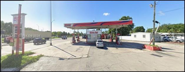 Closed Gas Station since November 2025 presenting a strong redevelopment opportunity. The fuel brand can be changed, allowing an owner or operator to rebrand, introduce a major or independent fuel flag, or explore alternative uses subject to approvals.
The property is strategically located on a major, signalized corner avenue, offering excellent visibility, strong traffic exposure, and convenient ingress and egress from multiple directions. This high-profile corner location enhances customer accessibility and branding potential.
The site consists of approx. 11,364 sqft. lot with approx. 117’ fronting NW 27 Ave. Building approx. 741 sqft, suitable for a convenience store, retail use, or potential expansion depending on zoning and permitting. The fueling infrastructure includes 4 pumps providing 8 fueling positions, allowing for efficient traffic flow and service capacity during peak hours. 3 x 10,000 UST. 
Overall, this asset offers significant upside for an owner-user or investor seeking to reactivate an existing fuel station, rebrand, or redevelop the property in a well-traveled corridor with strong fundamentals.