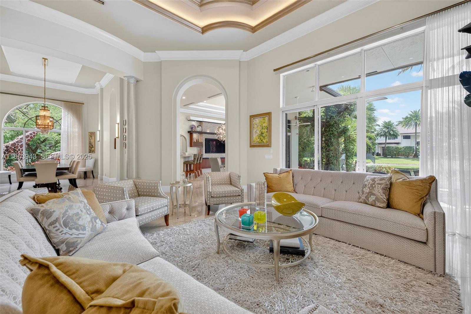 Exquisitely updated 1-STORY luxury family home in exclusive, gated Stonebrook Estates on approx 1/2 acre on quiet secluded CUL-D-SAC. Incredible Triple Split Floorplan w/ NO STEPS from front door. 2024 Flat Tile ROOF, IMPACT Windows, whole home GENERATOR. High End Upgrades: Marble & Porcelain floors, soaring coffered ceilings w/ rounded walls, crown molding & Designer Bathrooms, window treatments & lighting. Gourmet kitchen w/ Quartz Counters, professional grade appliances, Thermador Refrigeration, Viking GAS RANGE & double oven; open concept built-in family room Wall Unit w/ natural stone. CUSTOM EXECUTIVE OFFICE, GAME ROOM & luxurious primary suite w/ dual walk-in closets, jetted Tub, Spa Shower & Toto washlet. Southern exposure backyard, resort-style private oasis w/ INFINITY lagoon POOL, spa, cocktail table, SCULPTURE GARDEN, outdoor kitchen TIKI BAR w/ Lynx grill on gas line & lush tropical landscaping, Entertainers Backyard. 3-car garage w/ EV hookup, paver oversized CIRCULAR drive, new primary AC, gas water heaters, roller shades, LED high hat lighting & gas fireplace. Clubhouse, GYM, media & party rm, tennis, PICKLEBALL, Top Rated Schools, located adjacent to Southwest Ranches in best central location!