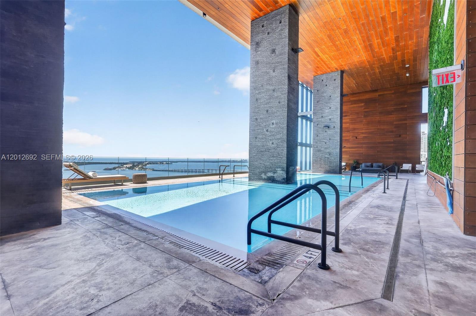 Refined 1-bed residence with spectacular bay and skyline views in one of Brickell’s most exclusive boutique towers. This elegant home features a spacious open layout with 10-ft floor-to-ceiling glass, premium stone floors, and a designer kitchen with Italian cabinetry, Carrera marble countertops, and top-of-the-line Wolf & Sub-Zero appliances, complemented by a built-in Bosch espresso system. Enjoy seamless indoor-outdoor living with an expansive balcony perfect for sunset entertaining, complete with a custom grill. Residents indulge in world-class amenities including 24/7 concierge, spa, fitness center, chauffeur service, bike storage, and a resort-style infinity pool with daily happy hour.