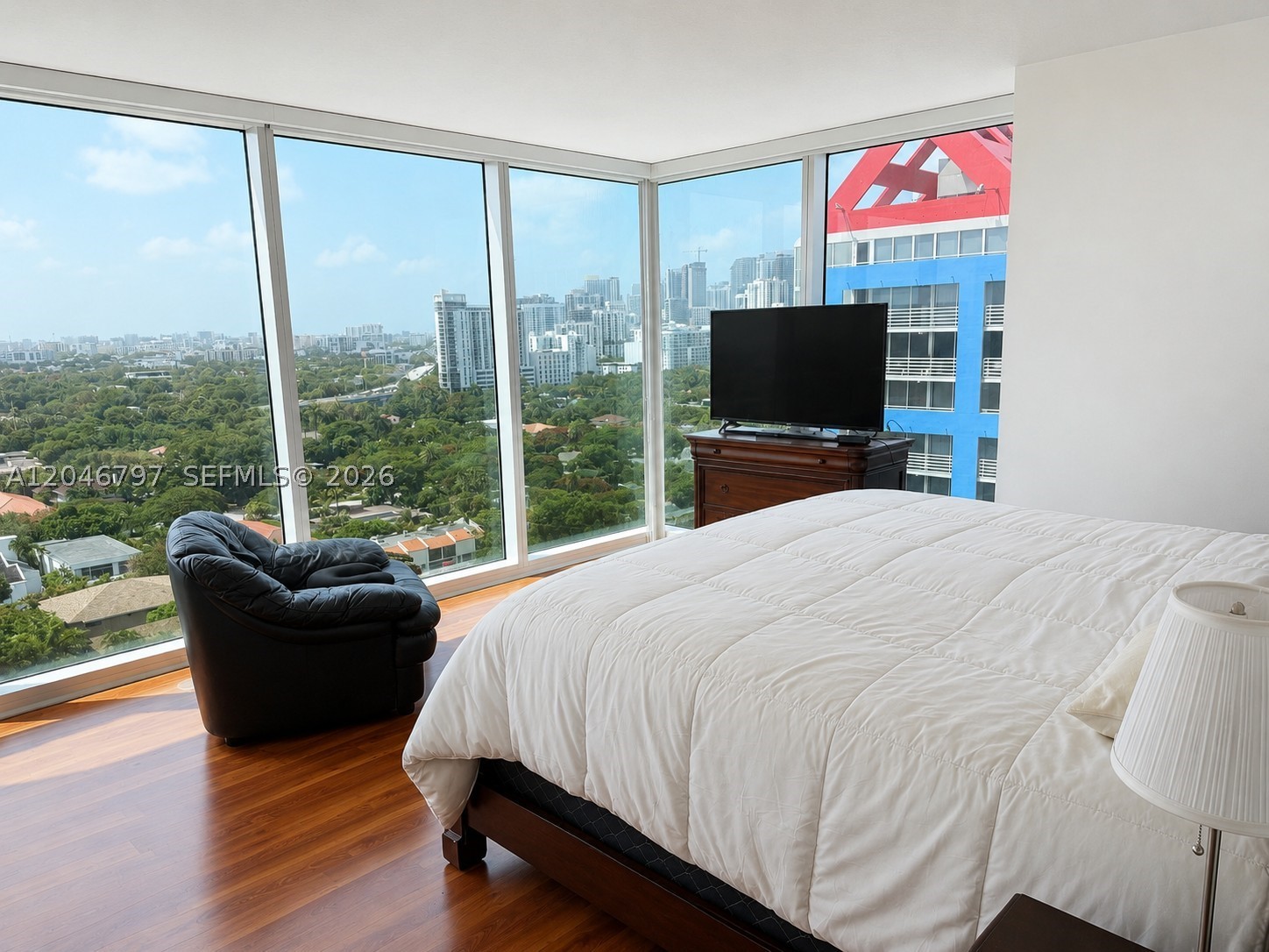 Experience exceptional natural light in this beautifully designed 2-bedroom, 2-bathroom corner residence featuring expansive, unobstructed city views through oversized windows. The thoughtfully designed open floor plan seamlessly connects the living, dining, and kitchen areas, creating an inviting space for both everyday living and entertaining. Step onto the private balcony to enjoy sweeping skyline views and fresh air. The contemporary open kitchen is appointed with granite countertops, stainless steel appliances, and ample cabinetry. The spacious primary suite is a true retreat, highlighted by dramatic floor-to-ceiling windows that fill the room with natural light. A generously sized second bedroom and full bath offer comfort and flexibility for guests, family, or a home office. Don't miss this exceptional opportunity to own a residence at Skyline, offering style, comfort, and breathtaking views in one of the area's most desirable communities.