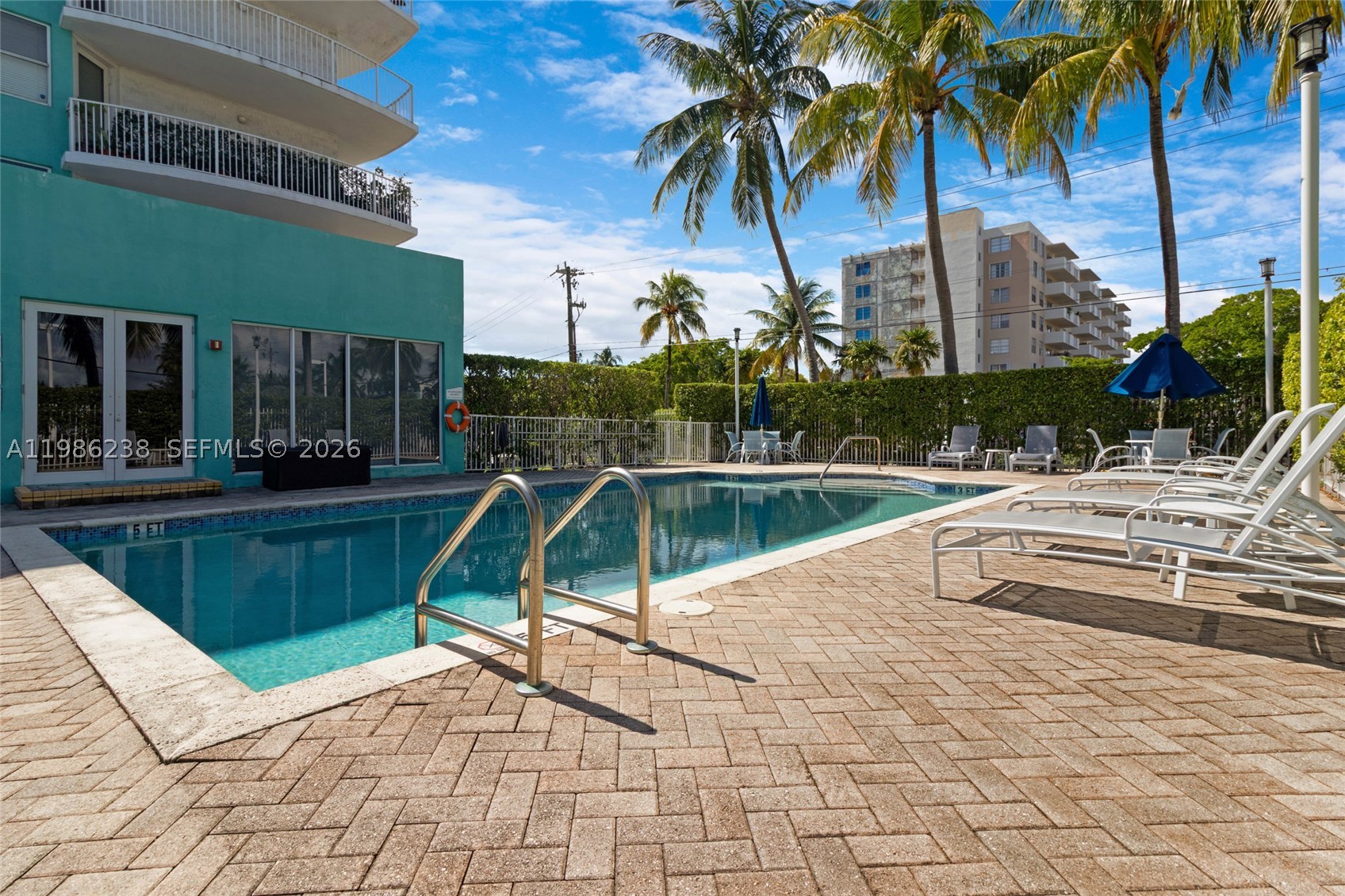Spacious Split bedroom in gated Boutique building with swimming pool and 2  Assigned parking spaces( #18 and 19).  Building has no litigations, No planned future assessments. Current assessments paid in full for Painting building.  Unit was freshly painted, has original bathrooms and kitchen but in great condition.  Tenant occupied until 1/31/2027 paying $2899.  Washer and Dryer in unit.  Association fees include water, trash, basic cable, insurance and reserves.