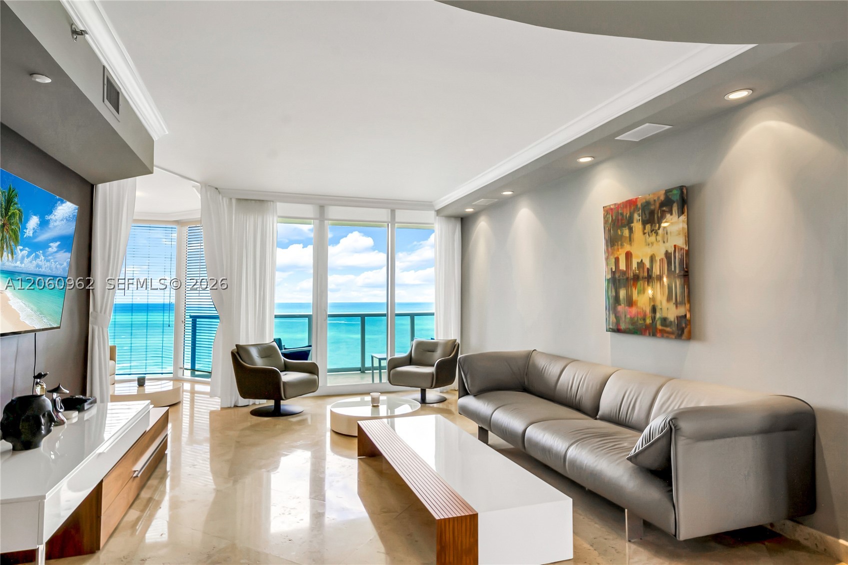 Priced to sell! 2 bed +a den/2.5 bath with modern design fully furnished turn key unit! Breathtaking Direct views of the Atlantic Ocean & the Intracoastal waterways where each day begins with a refreshing breeze from your Sunrise terrace & ends with stunning Sunsets from your sunset terrace. Indulge in a top-of-the-line kitchen featuring custom cabinetry & premium appliances, including a Bosch oven and dishwasher, and a Samsung Wi-Fi–enabled refrigerator with radio. Enjoy abundant built-in storages, a 160-bottle wine cooler in a chic wall unit, & a designer front door that sets the tone for elegance. This is luxury coastal living at its finest, blending modern design, comfort and breathtaking views in the heart of Sunny Isles Beach Florida Riviera.Unit comes with 1 assigned parking space , one free valet parking , 1 storage . 5 star amenities include : Full beach and pool service, pool side cafe , Fitness center , SPA , free fitness Classe for the residents , outdoor BBQ area , 24 hours security and valet