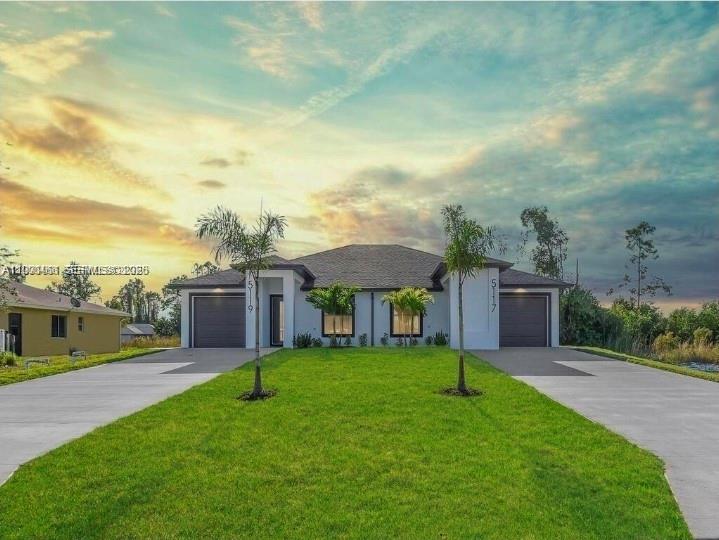 One or more photos have been virtually staged or AI-generated. Offering closing cost concessions! Brand-new 2026 duplex in Lehigh Acres with excellent income potential, estimated up to $60,000/year. This 6-bed, 4-bath property features modern finishes including 24x24 tile flooring, quartz Calacatta countertops, stainless steel appliances, gray cabinetry, and LED lighting. Each unit includes impact windows and doors, sprinkler system, and exterior security cameras. Master bath offers rainfall shower; second bath includes tub/shower combo. Property also features gutters, soffits, and upgraded landscaping. Includes 1-year appliance/system warranty and 10-year structural warranty. Located on an oversized lot near shopping and major roads. Great investment opportunity!