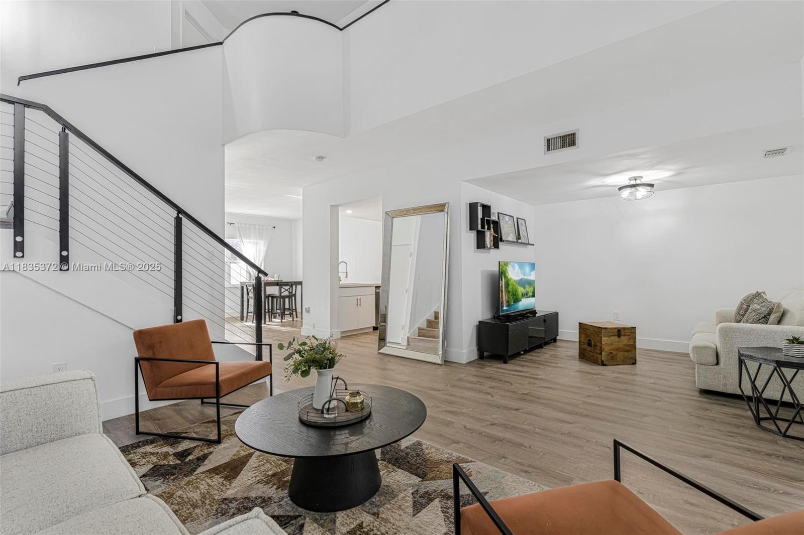Fall in Love the Moment You Walk In! This beautifully remodeled townhouse in the sought-after Adagio at The Hammocks community is a true gem! Featuring high ceilings both upstairs and downstairs, this spacious home is filled with natural light and a modern, open feel. No carpet – sleek laminate flooring throughout bathroom and kitchen with brand-new stainless steel appliances Accordion shutters throughout for peace of mind A/C is only 4 years old. The property is in move-in ready condition –. Located in a community that offers fantastic amenities:  Pool, Tennis Courts, Dog Park , Beautiful Green Spaces |