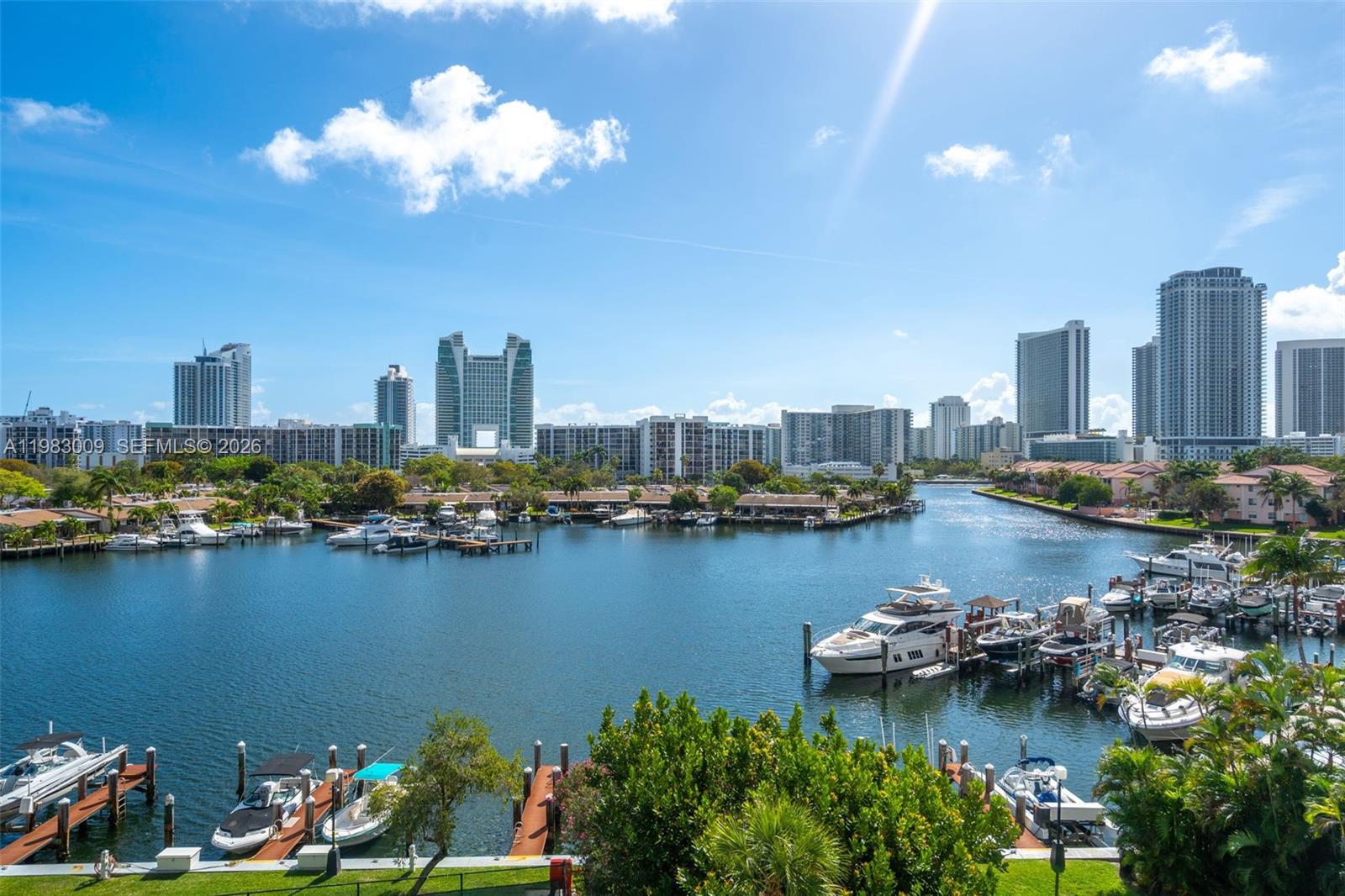 WATERFRONT ELEGANCE MEETS RESORT LIVING AT THE OLYMPUS

Experience the pinnacle of South Florida living in this sprawling 1,400 sq. ft. sanctuary, where every window frames a serene marina masterpiece. Completely reimagined for the modern lifestyle, this 2BR/2BA residence boasts a chef-inspired kitchen featuring crisp designer cabinetry, sleek stainless steel appliances, and a sophisticated backsplash that catches the coastal light.

Step across seamless tile flooring into oversized bedroom suites, each offering massive walk-in closets and spa-style updated baths. Whether you’re sipping morning coffee on your private balcony watching yachts glide by or enjoying the peace of mind that comes with a brand-new AC and completed 40-year certification, no detail has been overlooked.

The Olympus is a five-star retreat in the heart of the prestigious Three Islands enclave. World-class amenities include multiple resort-style pools, an elite fitness center, tennis courts, 24/7 valet, and covered parking. Boaters: take note of the private marina with available slips for vessels up to 30ft!

Perfectly positioned just minutes from the white sands of Hallandale Beach, the iconic Aventura Mall, Gulfstream Park, and FLL Airport. INVESTOR ALERT: This unit can be rented right away—perfect for a high-yield portfolio or a seasonal retreat. Easy to show and ready for its next chapter—schedule your private tour today!