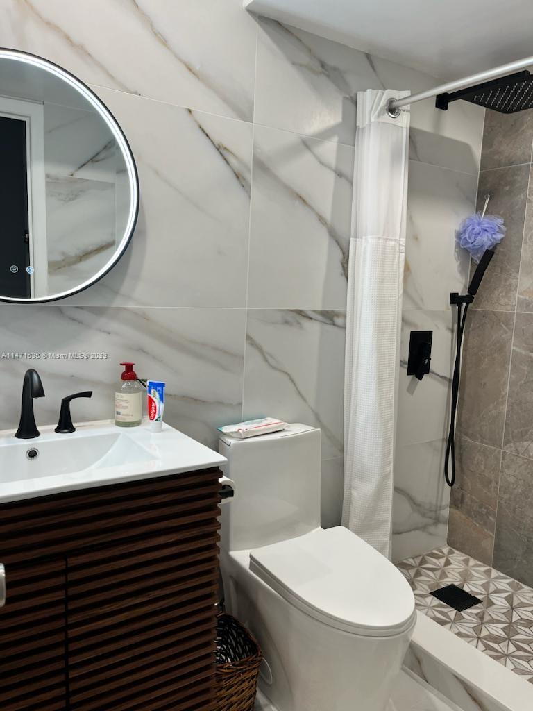 BREAKERS CONDOMINIUM - Residential Lease