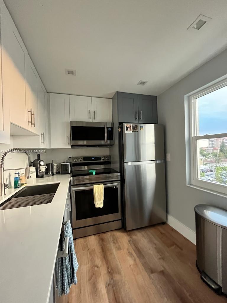 BREAKERS CONDOMINIUM - Residential Lease