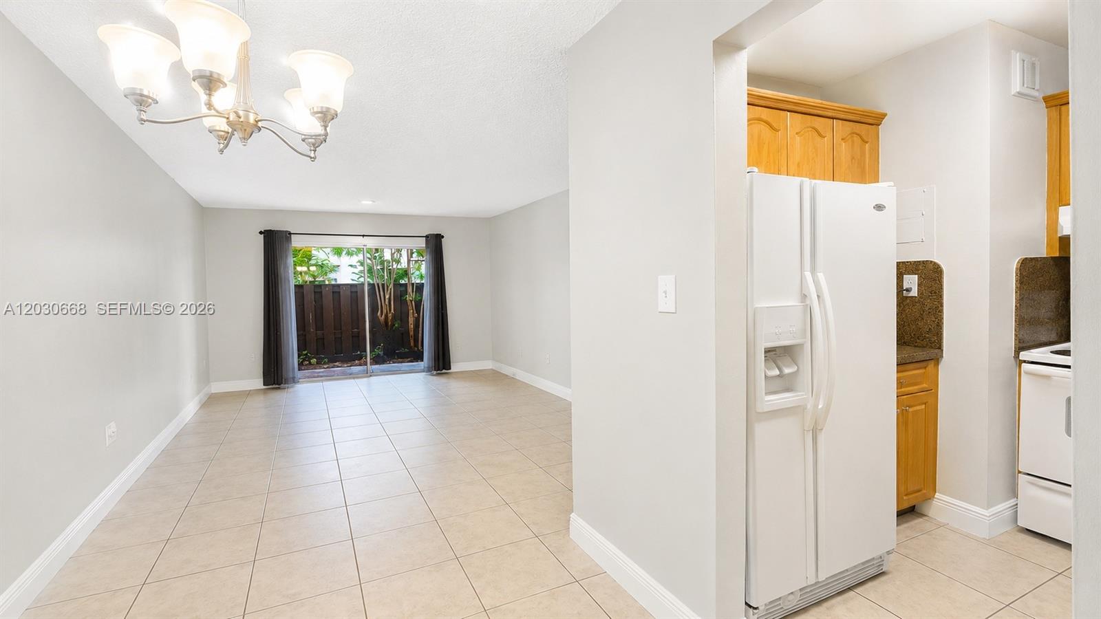 Lovely 1 bedroom/1bathroom apartment on the FIRST FLOOR of a gated community behind The Falls Mall. Nice, quiet and bright, this apartment offers a private fenced patio, tile floors throughout, walk-in closet and the convenience of laundry on the floor above. This gated community offers plenty of parking, 2 swimming pools, and boat/RV parking as well. Close to tons of restaurants, shops, transportation, everything! Easy to show!