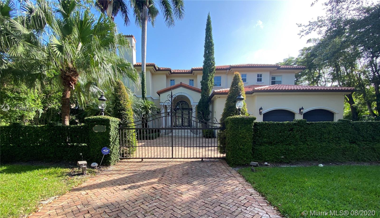 Classic elegance & modern sophistication define this exquisite Islands of Cocoplum sanctuary commanding 97 waterfront ft. Grand dbl-height Entry & soaring, light-flooded Living rm set the glamorous interior stage w/marble floors flowing thru the formal Dining rm. Contemporary eat-in Kitchen w/top-tier appliances & XL island opens to gracious Family rm w/covered Terrace & Water views. +Flr-1 Guest suite, Maid’s rm, Laundry & 3-car Garage. Upstairs: all Bdrms en suite w/wood floors & Walk-ins; luxe Master w/Office/Nursery, XL Walk-in, lavish Bath & expansive Balcony Terrace; descend the private exterior stair to the heated, Saltwater Pool. Impact windows/doors thruout. Broad open channel vistas, direct Bay access + oodles of Cocoplum amenities, including Clubhouse, Gym, Tennis Courts & Pool.