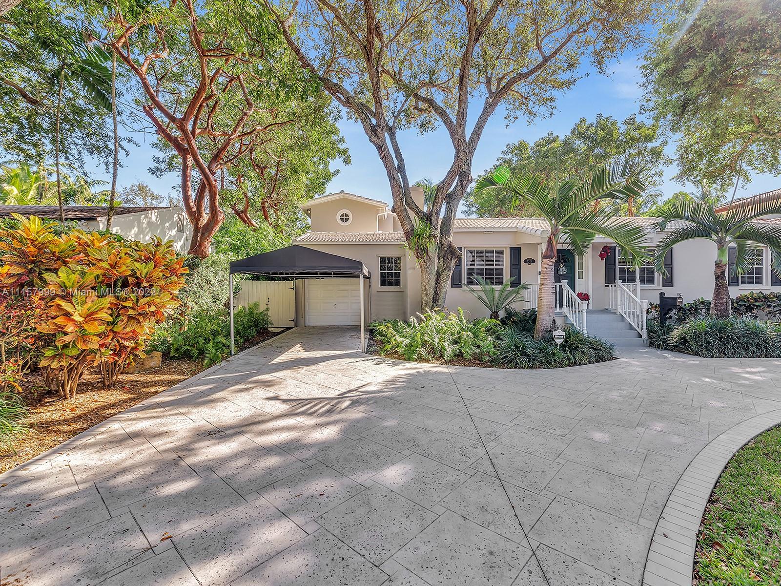 So much to love in this High Pines home! 4 bed., 2.5 baths. & Nannys quarters. Beautiful hardwood floors & many updates.  Split floor-plan w/master suite on 2nd. floor, master bath w/marble throughout, dual vanities & glass shower. Master bedroom w/view of lovely garden. First floor has 3 bed, 1.5 baths, formal living room, working fireplace, dining room, sun-filled family room opens to marble patio/garden. Eat-in-kitchen w/ample counter areas & sunroom. Office/homework space and indoor laundry. Original 1945 home updated 2003, adding 1034 sqft. Partial impact windows/doors, storage areas under air & in attic, outdoor shed. 2 HE central a/c units. Sprinkler system. Fenced yard. Nannys quarters easily converted back to garage, carport & ample parking. Walk to Sunset Elementary.