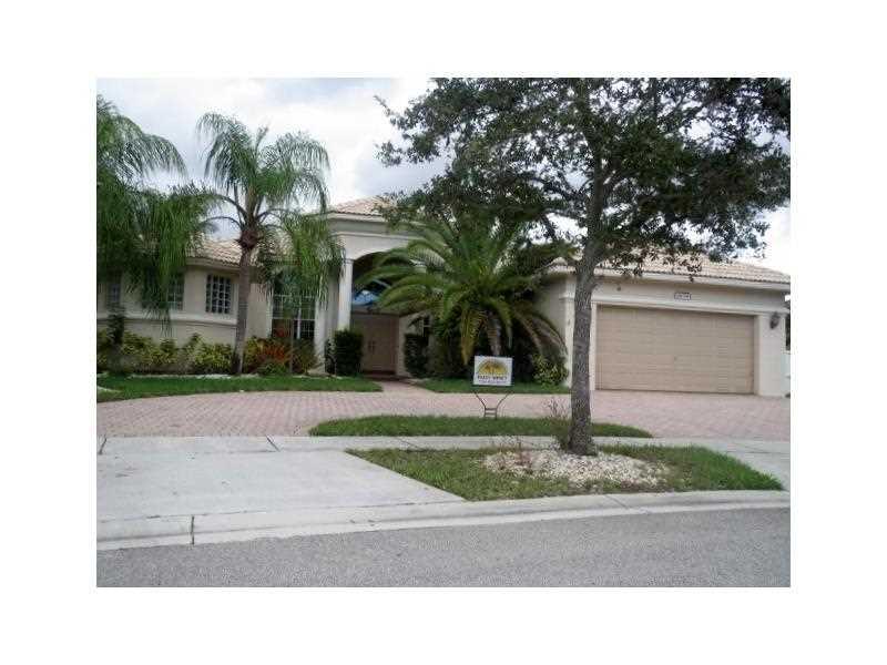 DEAL FELL THROUGH, BACK ON THE MARKET Stunning,Tastefully upgraded Monterey in prestigious gated community of Pembroke Falls. 4/3 plus office/den, oversized lot, freeform pool & spa, 2 car gar & paved circular driveway, lush landscaping & many palm trees. Interior upgrades include wood kitchen cabinetry & stainless steel appliances, double oven & granite countertops. Travertine floors & crown molding throughout common areas. Hunter Douglas & bamboo shades Samsung front load washer dryer, $80K+ in upgrades