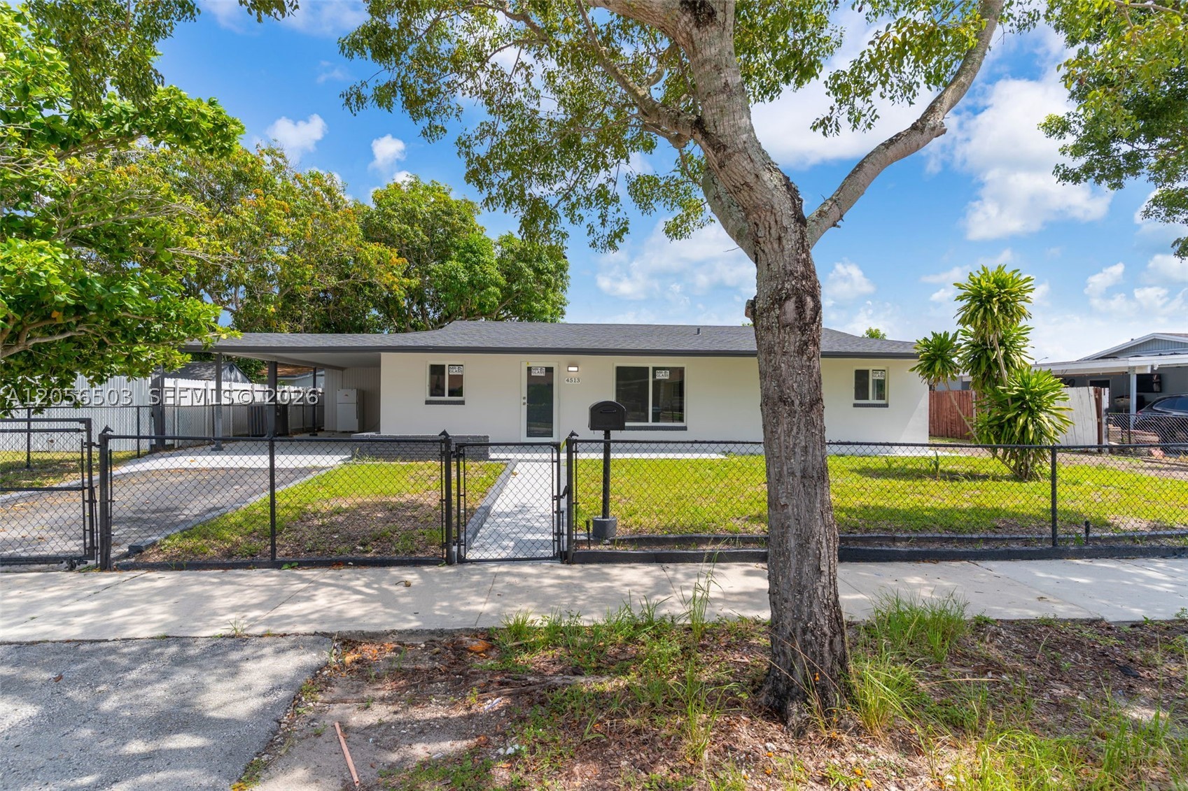 Beautifully remodeled 5-bedroom, 2-bath single-family home in the heart of Miami Gardens! This move-in-ready property offers the perfect blend of style, comfort, and functionality. Recent upgrades include a brand-new roof, impact-resistant windows and doors, modern flooring, a beautifully renovated kitchen with contemporary finishes, stainless steel appliaces, and updated bathrooms. The spacious floor plan provides plenty of room for a growing family, entertaining, or working from home. An additional storage room offers valuable extra space for tools, equipment, or seasonal items. Situated on a generously sized lot, the fully fenced backyard provides privacy and plenty of room to create your outdoor oasis, with space for a playground, or future outdoor entertaining area. Best of all, there is NO HOA, giving you the freedom to enjoy your property without association restrictions. Conveniently located near schools, parks, shopping, dining, and major highways, this turnkey home combines modern upgrades with an excellent location. Whether you're looking for your forever home or a fantastic investment opportunity, this exceptional property is ready for its new owner. Don't miss your chance to own this beautifully updated Miami Gardens gem!