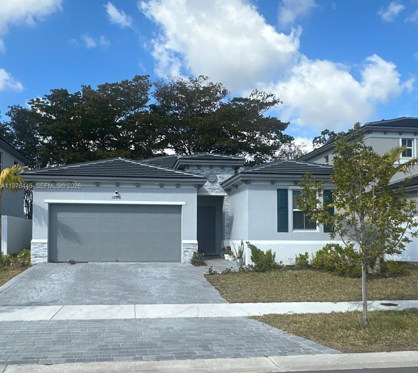 Beautiful 4bed 3ba single family home built in 2024,located in the desirable Southwest Miami area.This modern residence offers a functional and spacious layout designed for comfortable family living and effortless entertaining.The home features a double garage and bright open living areas filled with natural light, creating a warm and inviting atmosphere.The well-designed floor plan provides flexibility and comfort, ideal for both everyday living and special gatherings.Enjoy peaceful canal views from the backyard, offering added privacy and a serene outdoor setting perfect for relaxing or hosting guests.The outdoor space provides room to personalize and create your own private retreat.Additional highlights include a whole-house water purification system, ensuring enhanced water quality throughout the home, and a fully installed alarm system for added security and peace of mind.
Conveniently located near major highways,schools, shopping centers,and dining options, this property combines modern construction with an established neighborhood setting.Excellent opportunity to own a newly built canal front home in Southwest Miami.Schedule your private showing today.