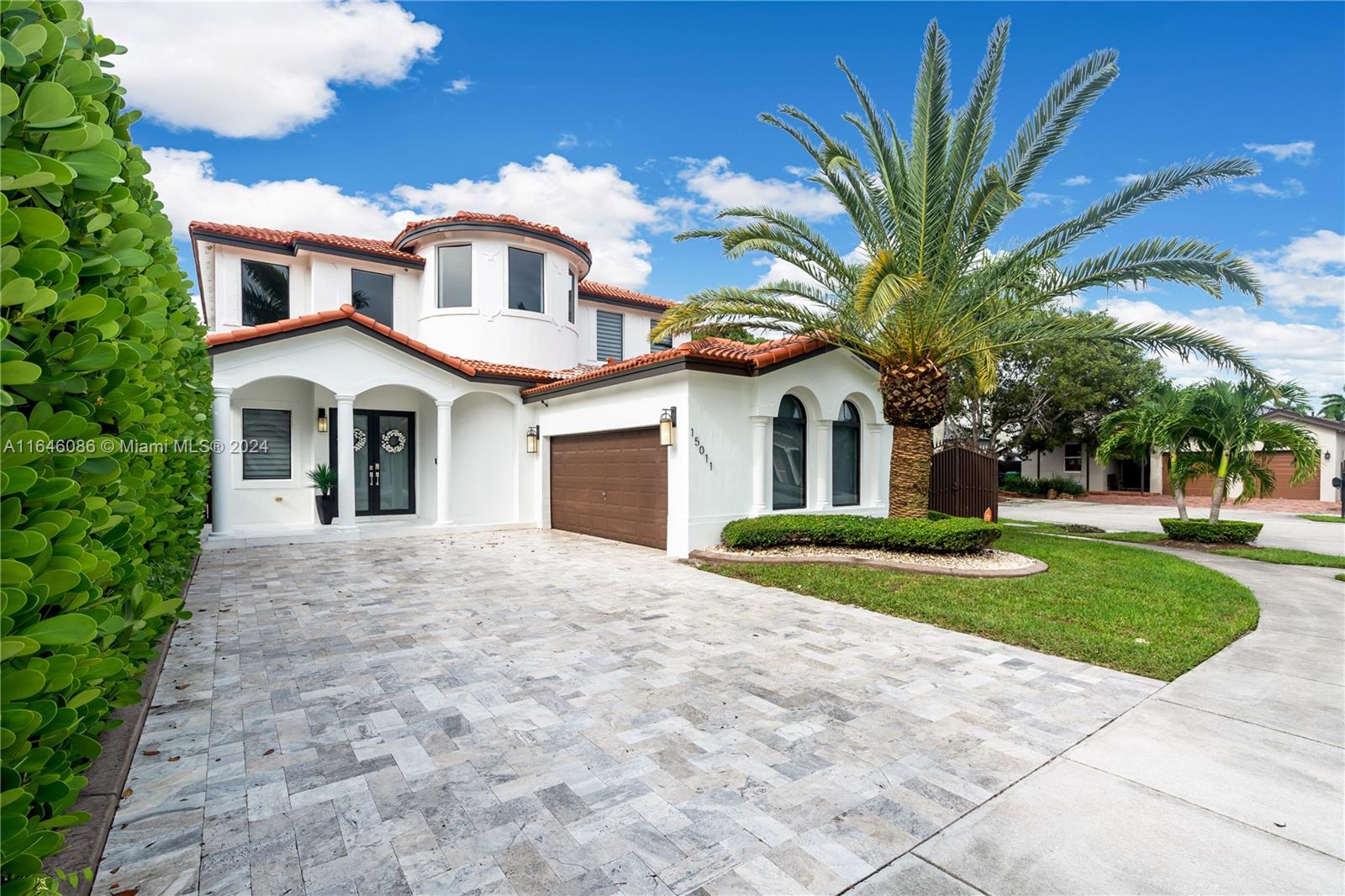 Nestled in one of Miami's most sought-after neighborhoods, this stunning corner home combines modern elegance with convenience and functionality. The home’s sophisticated design is evident from the moment you arrive, with its impressive curb appeal and low-maintenance landscaping. Step inside to find an open living area that flows seamlessly into a high-end kitchen, complete with quartz countertops, a waterfall island, and stainless-steel appliances. The 5 bedrooms and 3 stylish bathrooms provide ample space for family and guests, while the serene pool with spa and LED lights offers a private retreat. With an attractive interlocking driveway, and easy access to nearby amenities and highways, this home is the perfect setting for your next chapter to unfold.