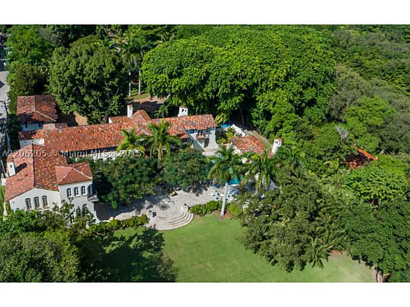 LA BRISA. One-of-a-kind, immense Mediterranean Estate w/lush landscaping & secret garden that leads to an observation deck w/direct ocean & bay views. Walking distance to Iconic Downtown Coconut Grove, this glorious 6.9 acres estate offers the upmost secl usion & extravagant living. A truly magnificent residence w/stunning exterior & interior details, complimented w/grand courtyard w/pool, fountain, summer kitchen w/ Argentinian Parrilla, office & a beautiful guest cottage. Opportunity for development!