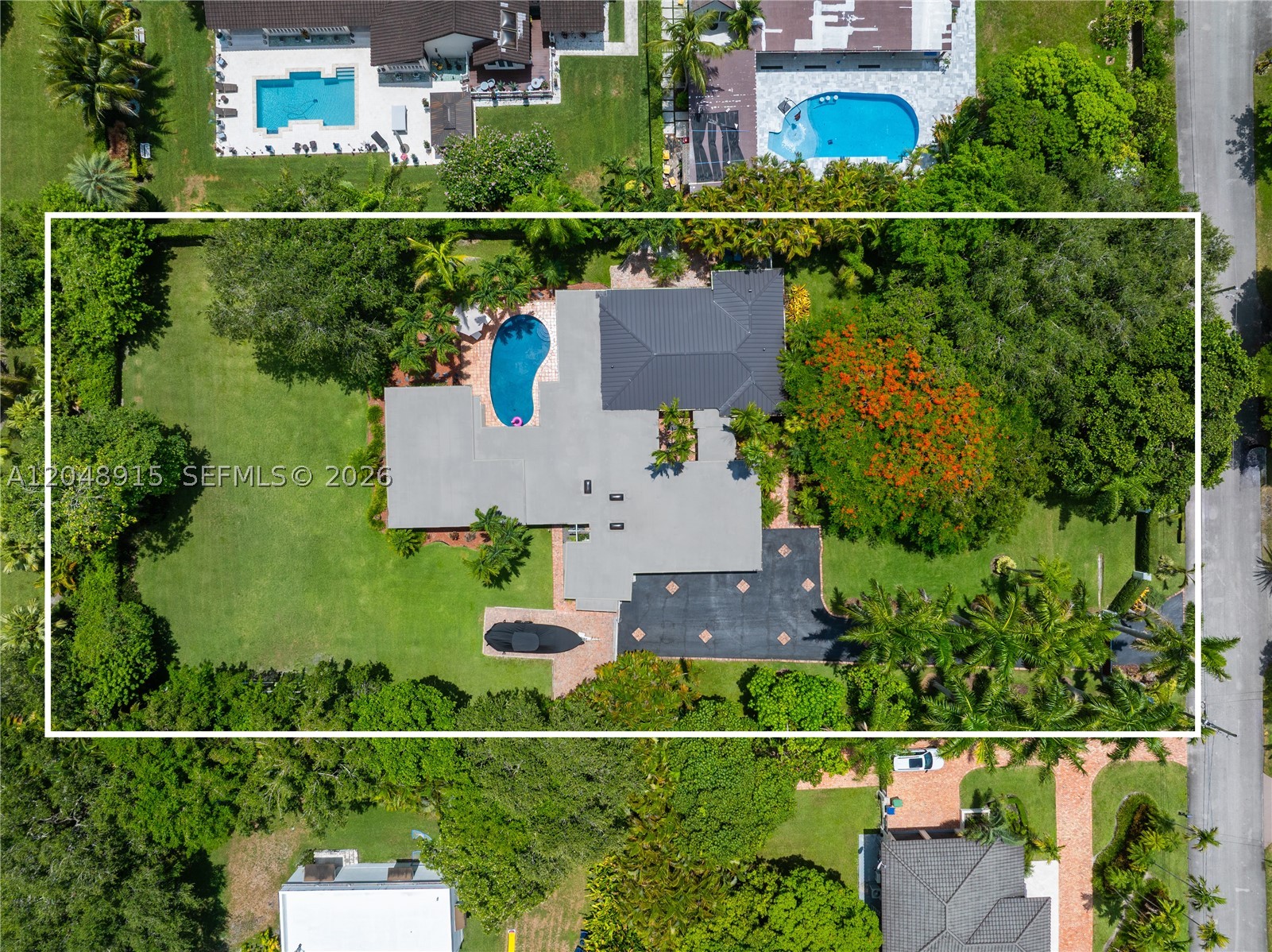 An exceptionally rare opportunity to own a gated estate on more than one acre in Miami's prestigious Gatlin Acres. Beyond a private entrance and a majestic royal palm-lined driveway, this beautifully updated ranch-style residence is nestled among lush tropical landscaping and mature specimen trees, offering a remarkable sense of privacy in one of the city's most desirable estate communities. Located within the highly sought-after Palmetto school district and just minutes from premier shopping, dining, and major commuter routes, the property offers the perfect balance of tranquility and convenience. Designed for seamless indoor-outdoor living, the home opens to a newly renovated resort-style pool, expansive entertaining patio, and an incredible backyard spanning over an acre. Recent improvements include a new roof and beautifully updated pool, allowing the next owner to enjoy the property with added peace of mind. A detached guest house offers exceptional flexibility and can serve as private guest accommodations, a home gym, office, studio, or flex room tailored to your lifestyle. Whether hosting family and friends or envisioning future enhancements, the sprawling grounds provide endless possibilities for a guest house, sports court, additional garage, or custom outdoor amenities. Combining an oversized homesite, exceptional privacy, and limitless potential, this is a truly one-of-a-kind offering in a neighborhood where opportunities like this rarely come to market.