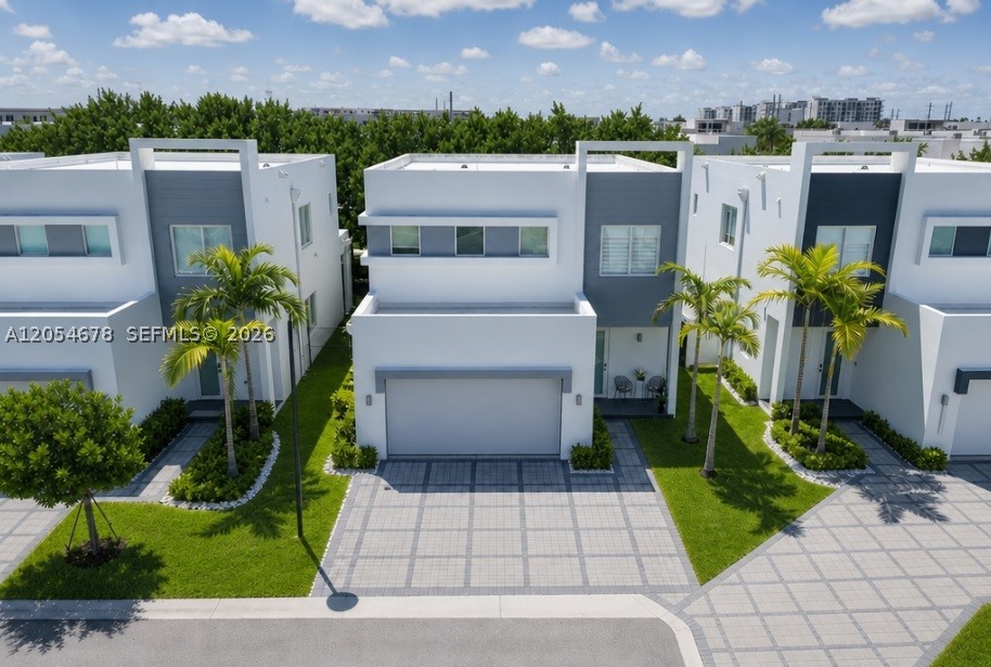 Luxury residence in the exclusive gated community ICON Estates. This stunning 5-bedroom, 4.5-bath home showcases contemporary architecture, premium finishes, and an open-concept design filled with natural light. The thoughtfully designed floor plan includes a first-floor guest suite with a private bath, spacious living and dining areas, and a gourmet kitchen with modern cabinetry, quartz countertops, and stainless steel appliances. Enjoy a private fenced backyard, perfect for relaxing, entertaining, or creating your own outdoor oasis. The home also features a 2-car garage and a spacious driveway. Residents of ICON Estates enjoy resort-style amenities, including a clubhouse, fitness center, swimming pool, and beautifully landscaped common areas. Conveniently located near top-rated schools, shopping, dining, major highways, and Miami International Airport, this exceptional home offers the perfect combination of luxury, comfort, and convenience.
