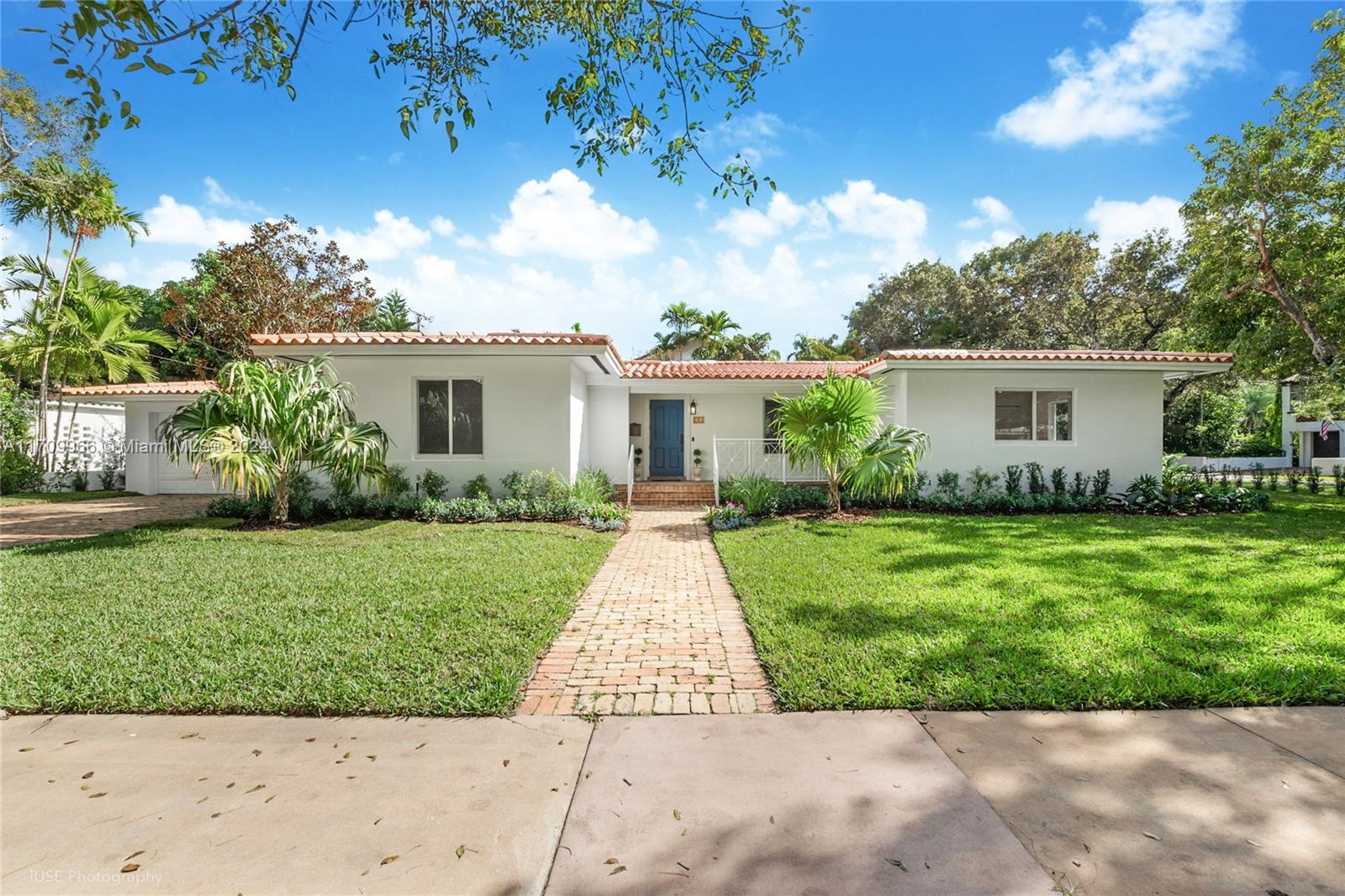 Experience the charm of Coral Gables w/this pristine 1-story home, immediately available for rent. Nestled on a spacious 12,600 sqft. corner lot, this residence boasts 3 bedrooms, 2.5 bathrooms, & bright, sunlit spaces in every room. Enjoy peace of mind w/impact glass throughout, complemented by updated kitchens & baths, new blinds, light fixtures, and SS appliances. Home features tile floors in the main living areas & beautifully stained wood floors in bedrooms. Generously sized closets & abundant storage space add convenience, while a laundry room w/a utility sink enhances functionality. The property includes a one-car garage, a carport, & Chicago brick driveway. Perfectly located between Bird Road & Granada, near the iconic Biltmore Hotel, this is a spectacular rental opportunity!