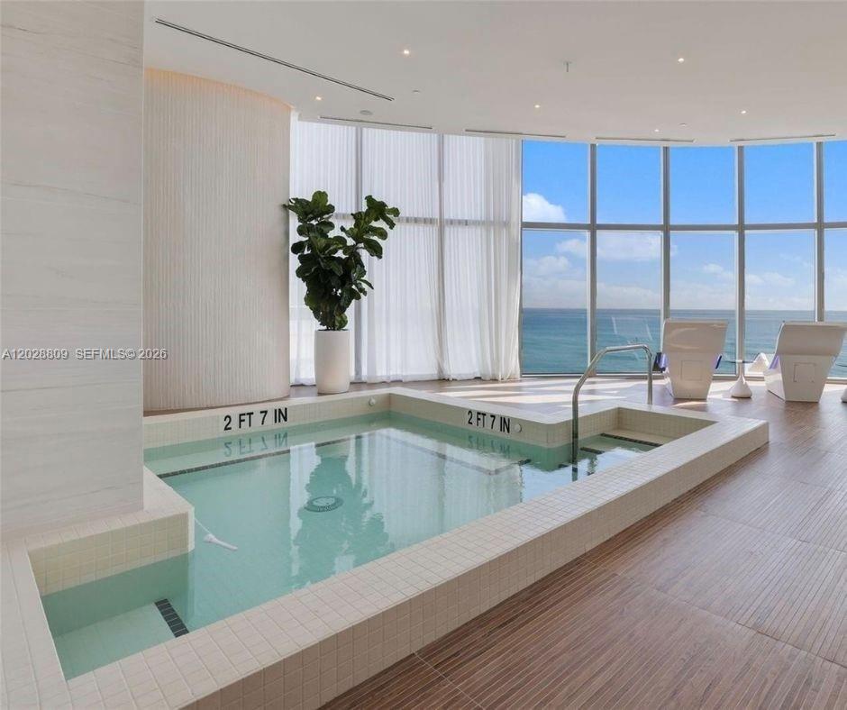 15701 COLLINS CONDO - Residential Lease