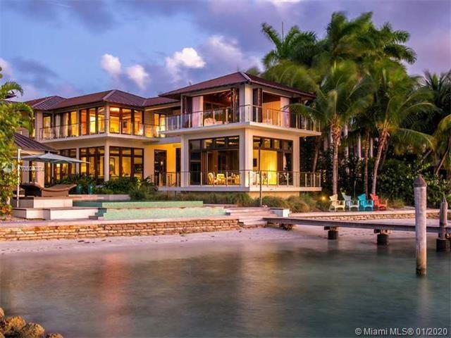 Premier ultimate privacy, breathtaking ocean views, Private Beach & Private Dock, situated on Key Biscayne's most exclusive & sought after street Harbor Point. This ultra-luxury modern Island Fusion residence provides the rare combination offering the fin est in luxury living. Dramatic double height atrium welcoming you to 7 bedrooms, 9.5 bathrooms. Sleek and modern bar in the interior & two story cabana with Nana walls on the gorgeous infinity pool deck provide the optimal entertaining experience.