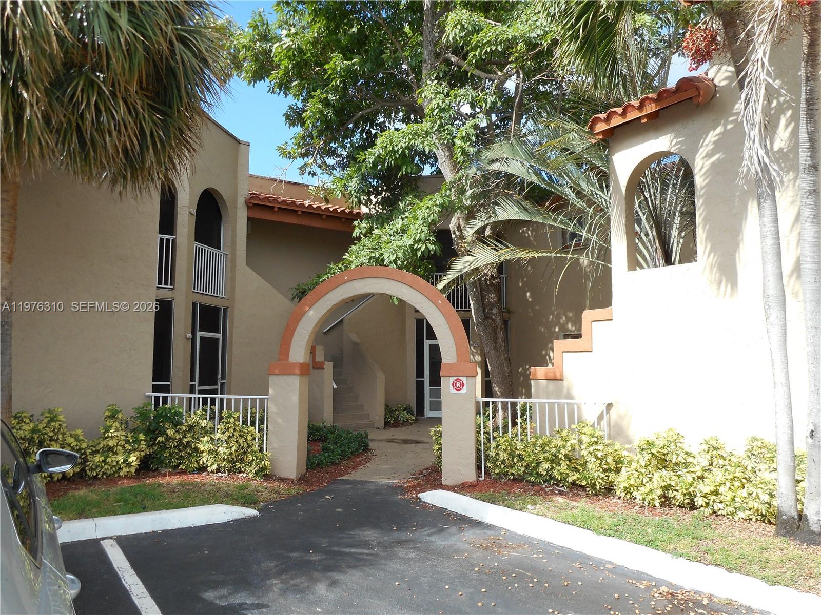 Gorgeous 3 bedrooms 2 Baths on first floor. Courtyard style. In the heart of Pembroke Pines. Features tile floors on main areas and newer wooden laminated on the bedrooms. Washer and dryer in the unit. Walk-in closets. With storage space. Accordion hurricane shutters. Conveniently located near I-75, Pines Blvd, with easy access to shopping, dining, schools, etc. Water is included with Hoa fees. A roof was completed in August 2022 on the building. Per association: Minimum credit score 700. No leasing for the first 24 months.