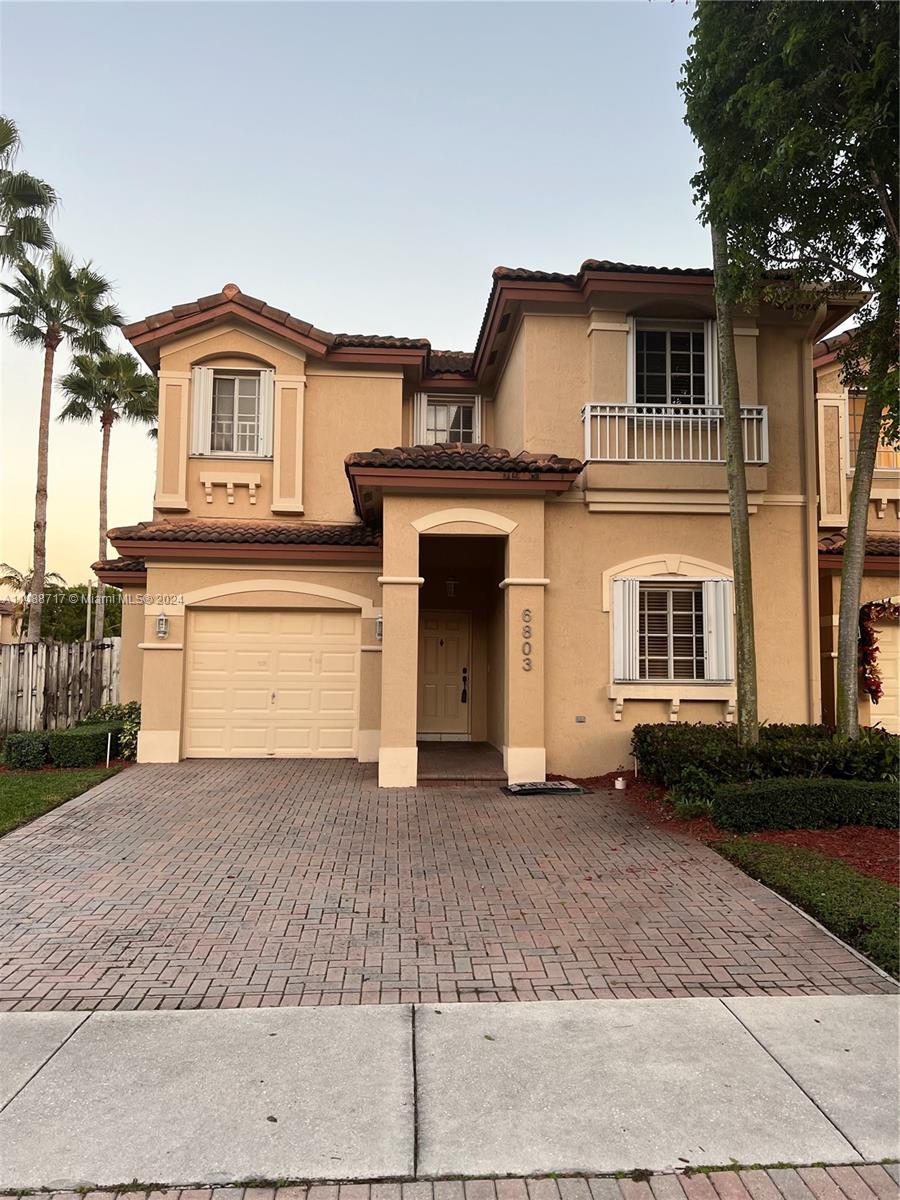 Beautiful Corner coach home, huge patio for entreatment at St.Lucia at Doral.1 bedroom with full bath downstairs. 3 bedroom and family room upstairs. Ceramic and wood floor. Quite and well maintenance community. Easy to show, Required 24 hours for showing. Tenant until first week of January