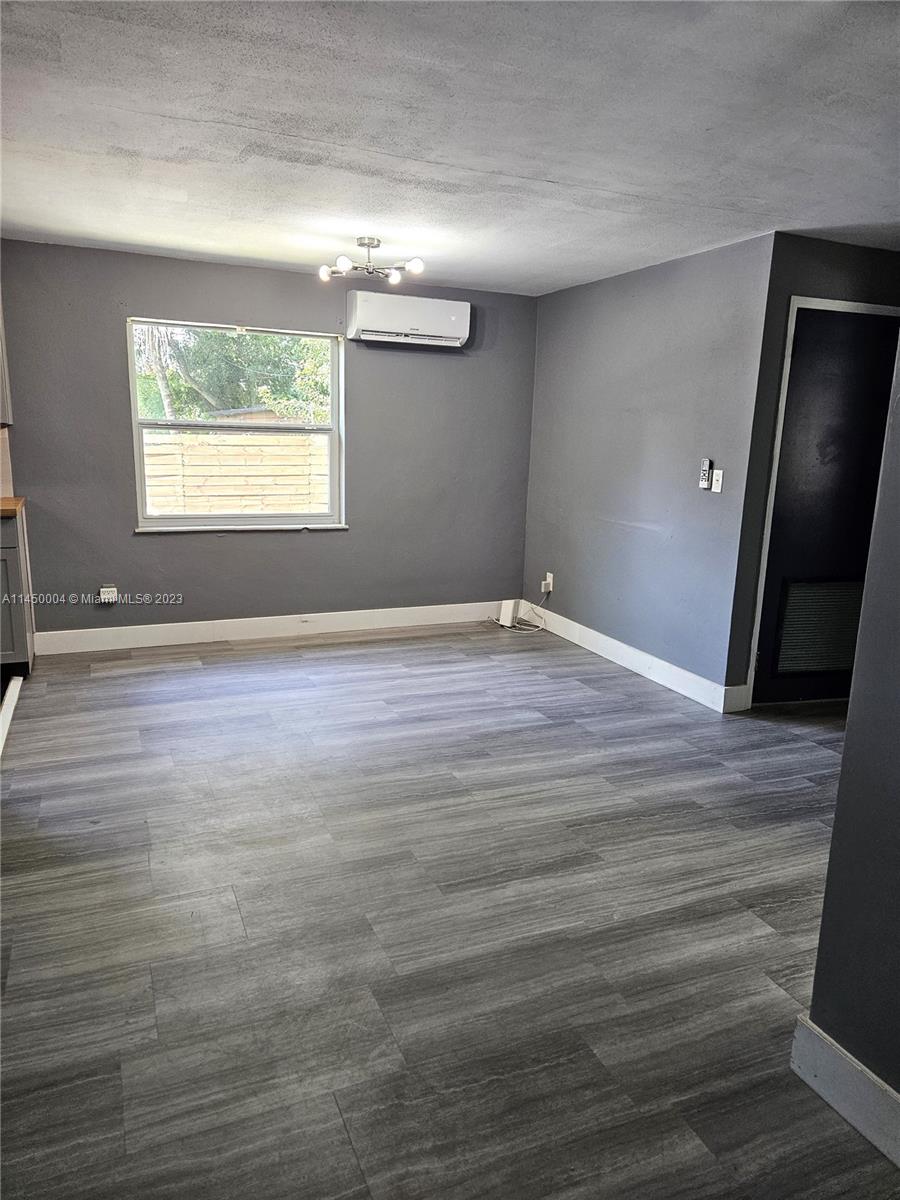 This inviting residence offers a perfect blend of comfort and style, with a range of features that will make you feel right at home. Freshly painted interior, wood laminate floors, upgraded kitchen & bath. The upgraded bathroom offers modern fixtures and finishes. Enjoy a private, fenced backyard and a cute front patio. Modern conveniences meet comfort in this inviting space. Washer/dryer hookups available. Conveniently located near schools, parks, and shopping. Your peaceful oasis awaits!