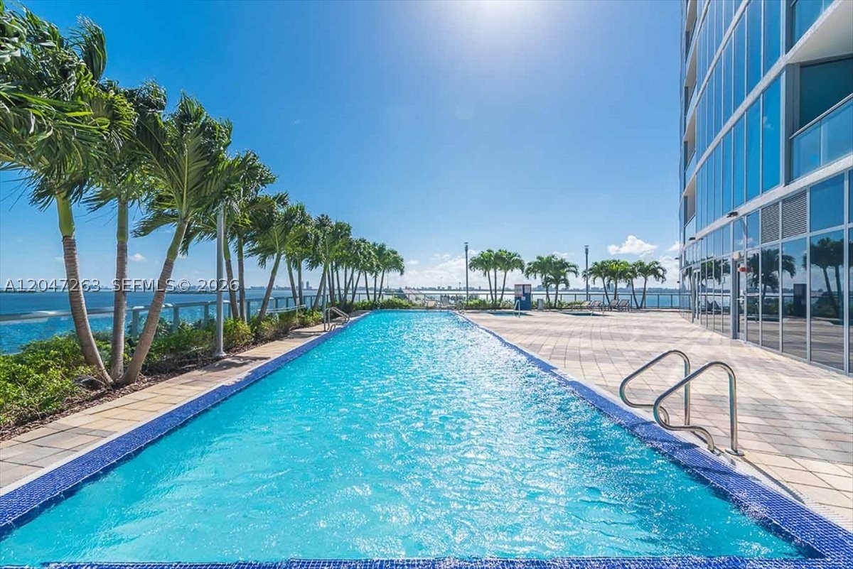 Prime location! Beautiful Condo with amazing views of Biscayne Bay! Unit features 2 spacious master suites and an additional convenient half bath. Marble flooring. 1 assigned parking space + 1 valet parking space. Kitchen with stainless steel appliances with granite countertops. Great amenities, 2 swimming pools, conference room, party room, BBQ area, kids room, business room and gym. Additional Valet Parking service. Walking distance of Miami Design District, Midtown and beaches.